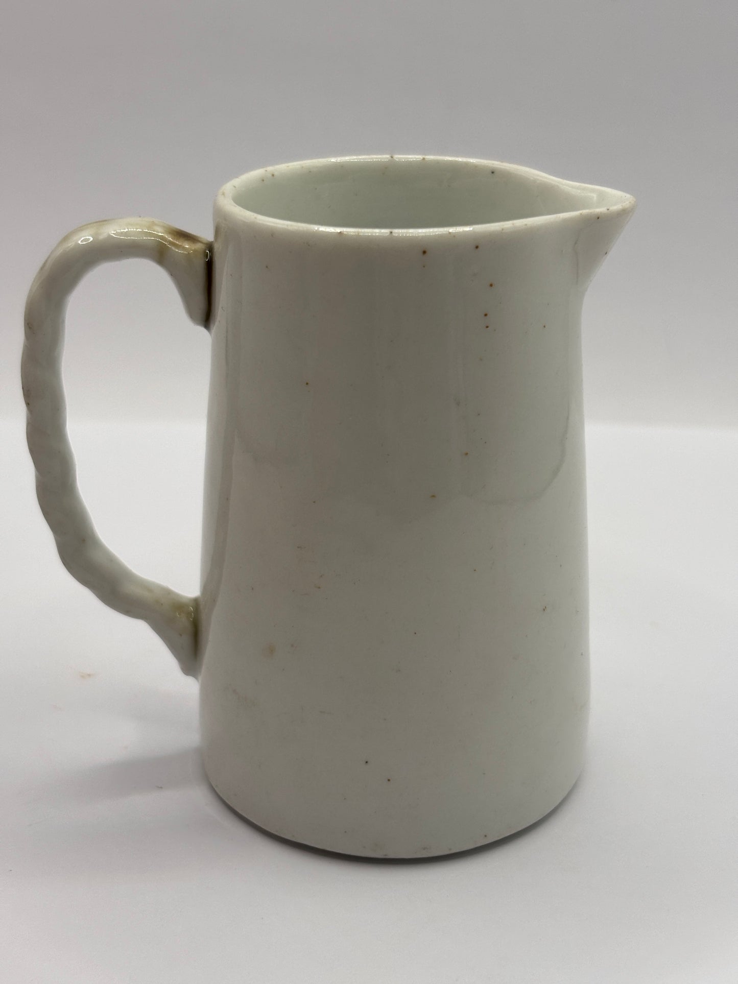 Old small white jug. 8cms