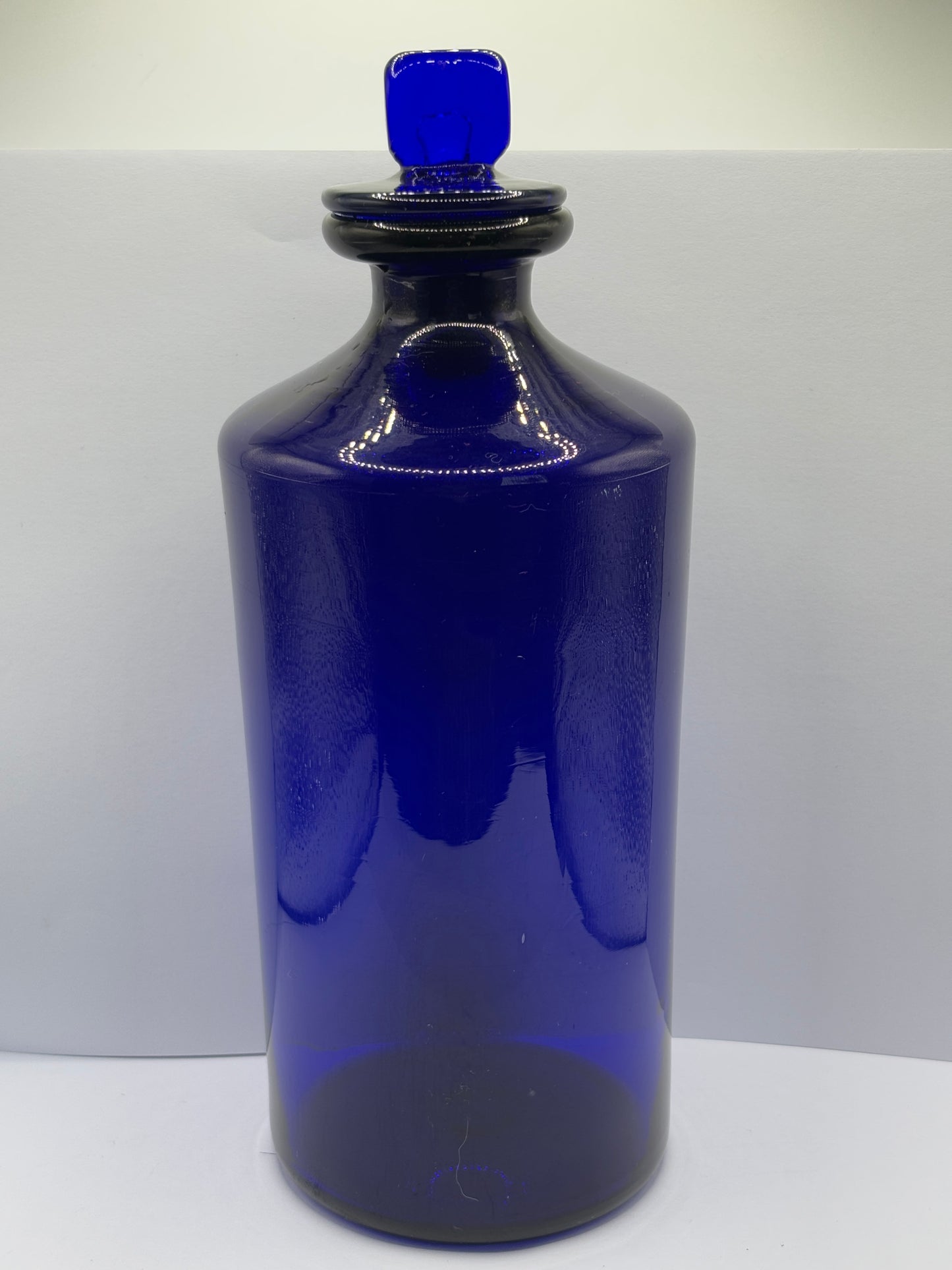 Old pontilled blue glass chemist jar, chemist round. Pharmacy