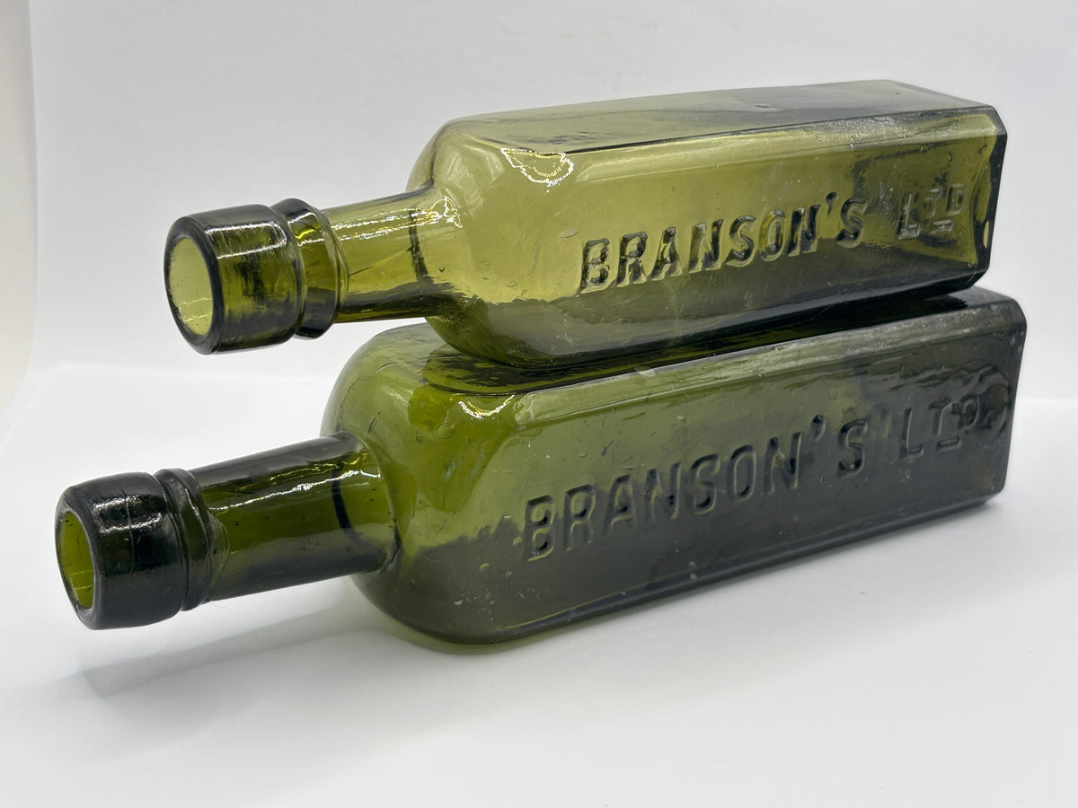 2 Old green glass Branston sauce bottles