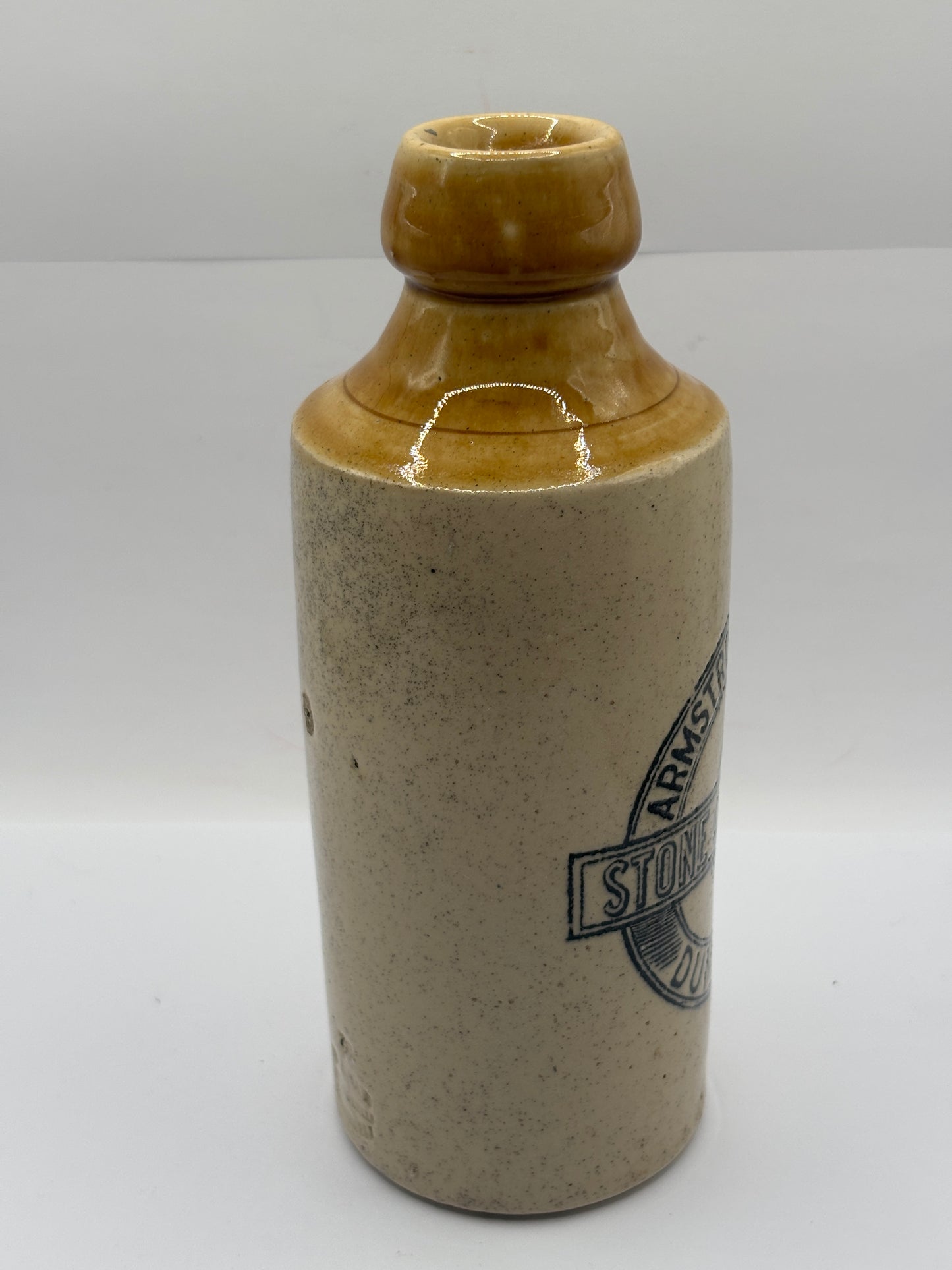 Old stoneware ginger beer bottle, Armstrong & Dickie Dumfries