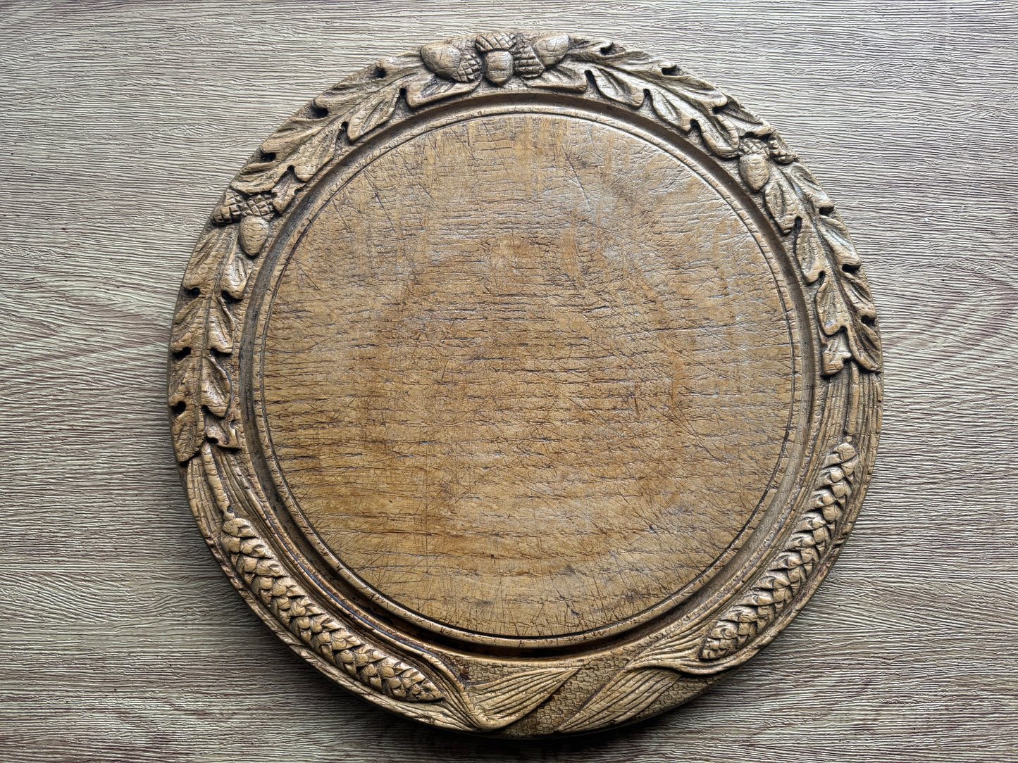 Antique oak carved bread board