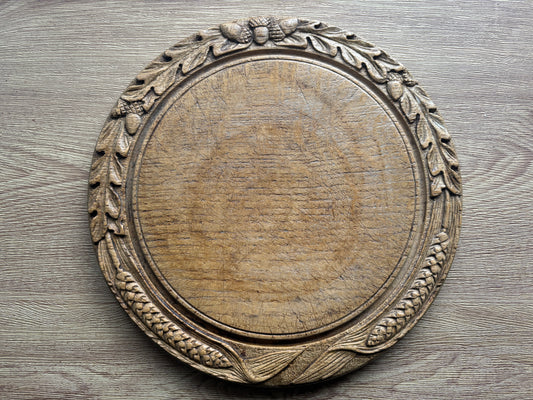 Antique oak carved bread board