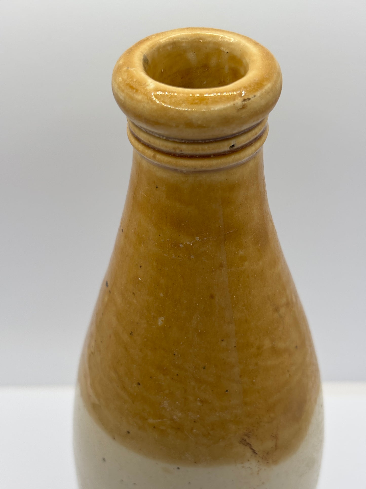 Old plain stoneware ginger beer bottle (B)