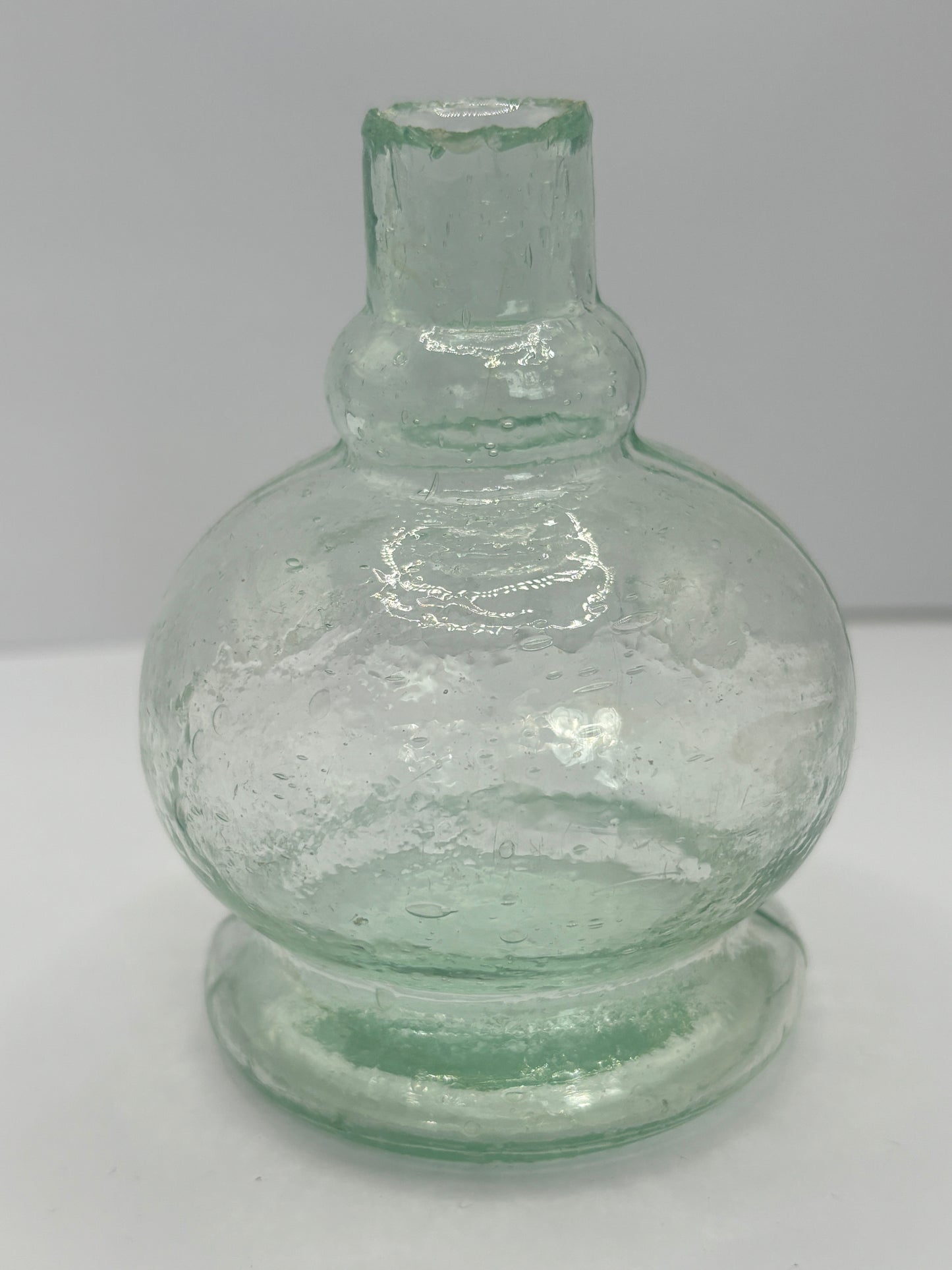 Small aqua glass oil lamp. The Lamp