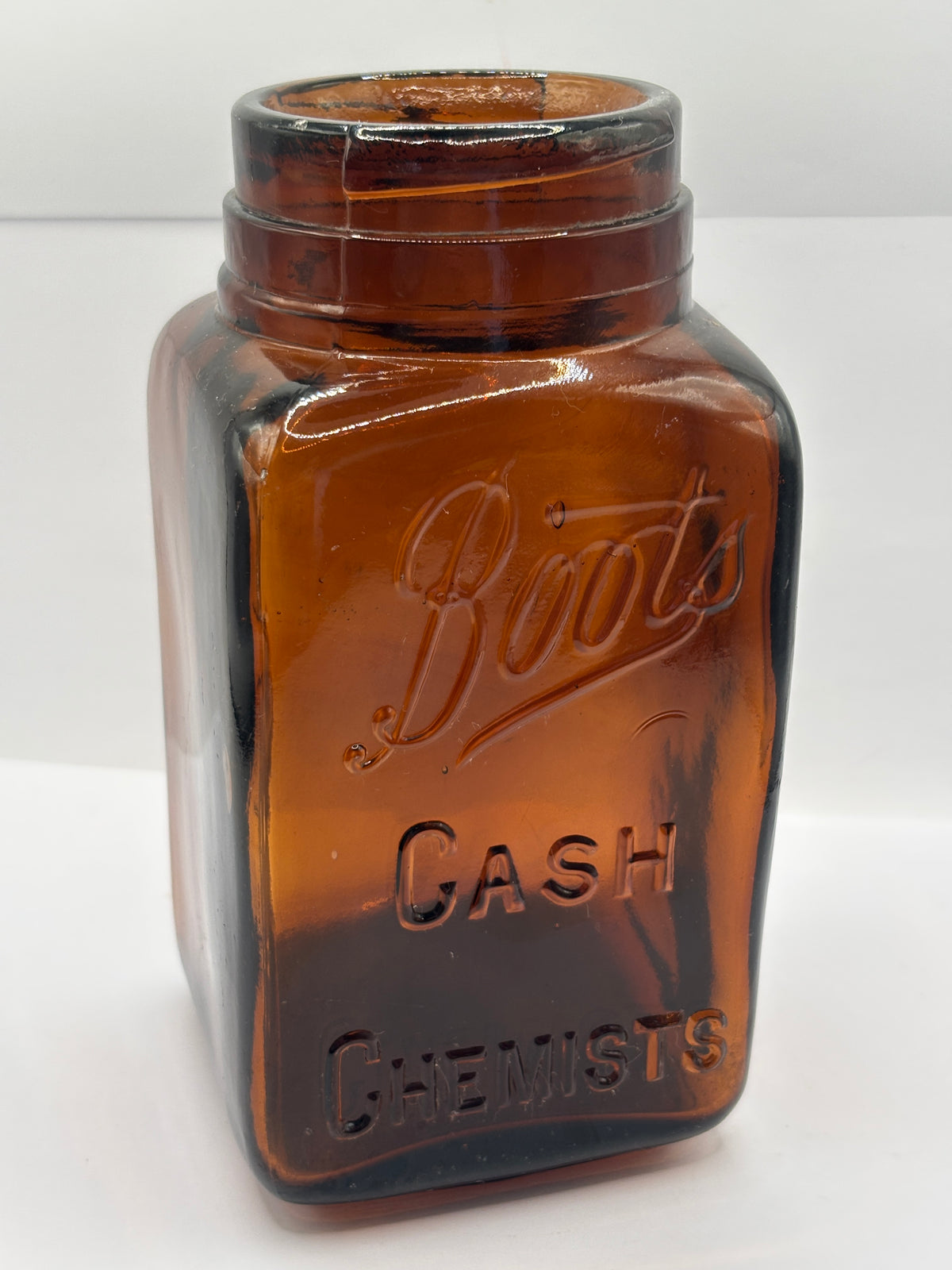 Old amber glass Boots Cash chemists jar 16cms