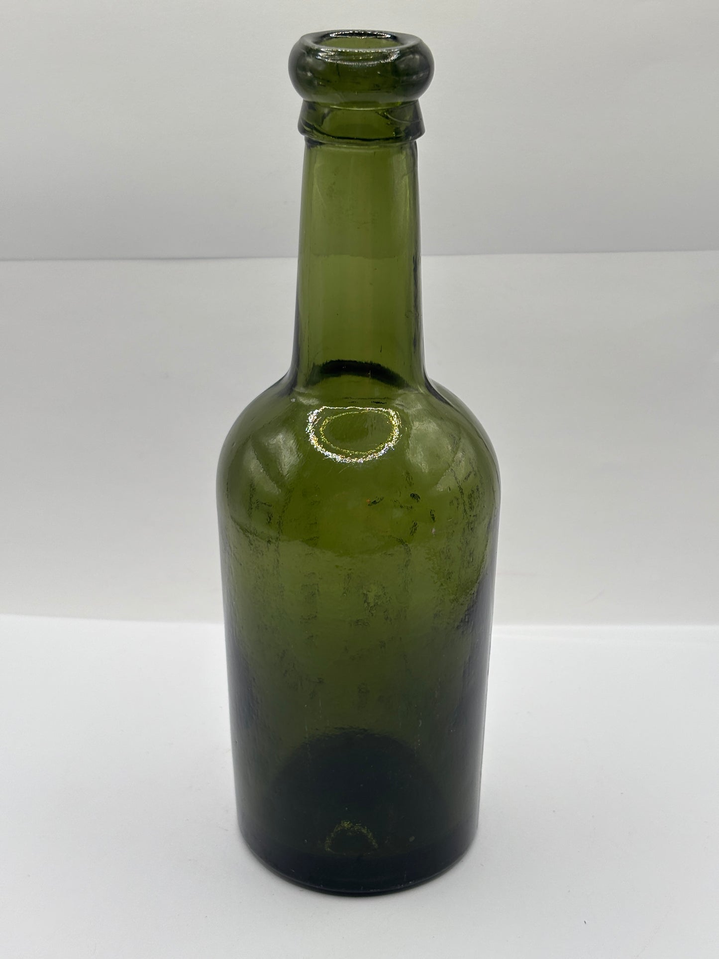 Old advertising green glass beer bottle, Austin Craven Manchester