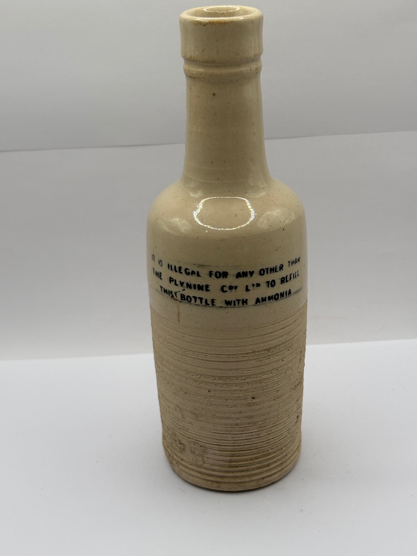 Old White stoneware ammonia bottle, Plynine household ammonia 21cms
