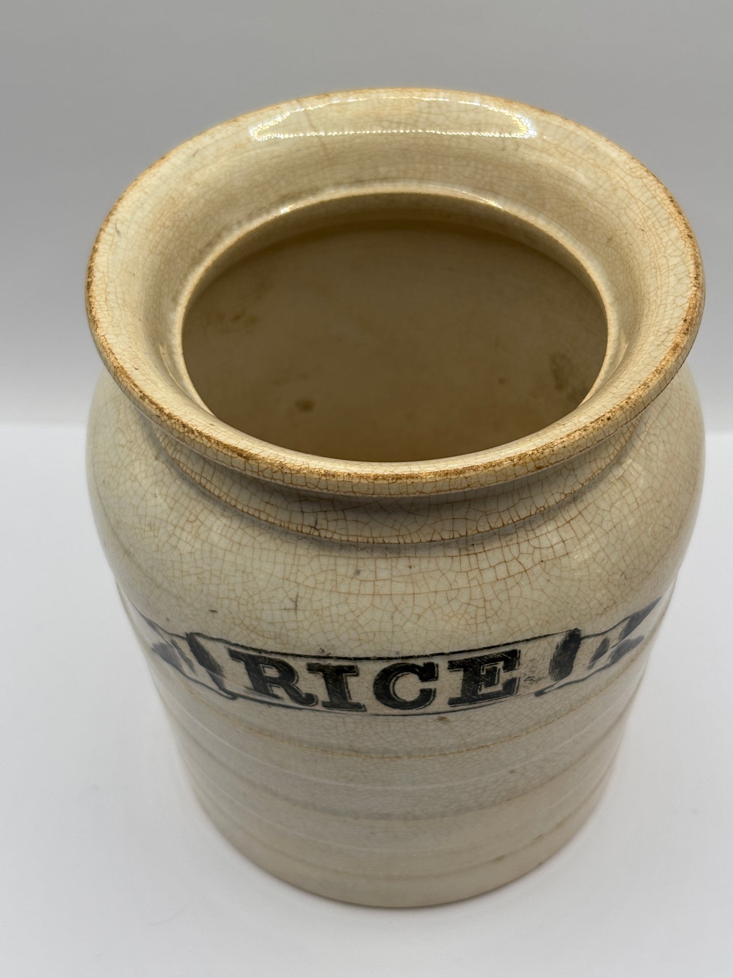 Old rice jar, stained & crazed