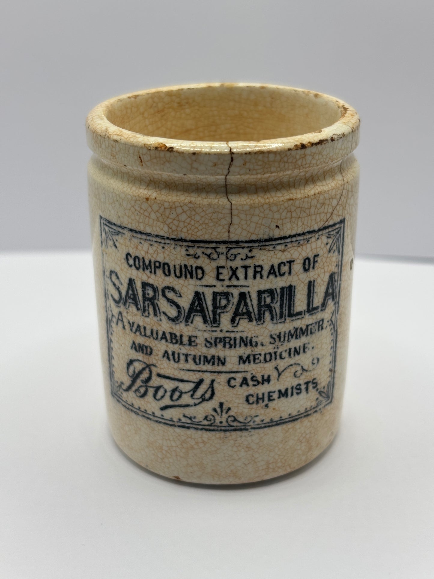 Old stained & crazed advertising Boots sarsaparilla jar