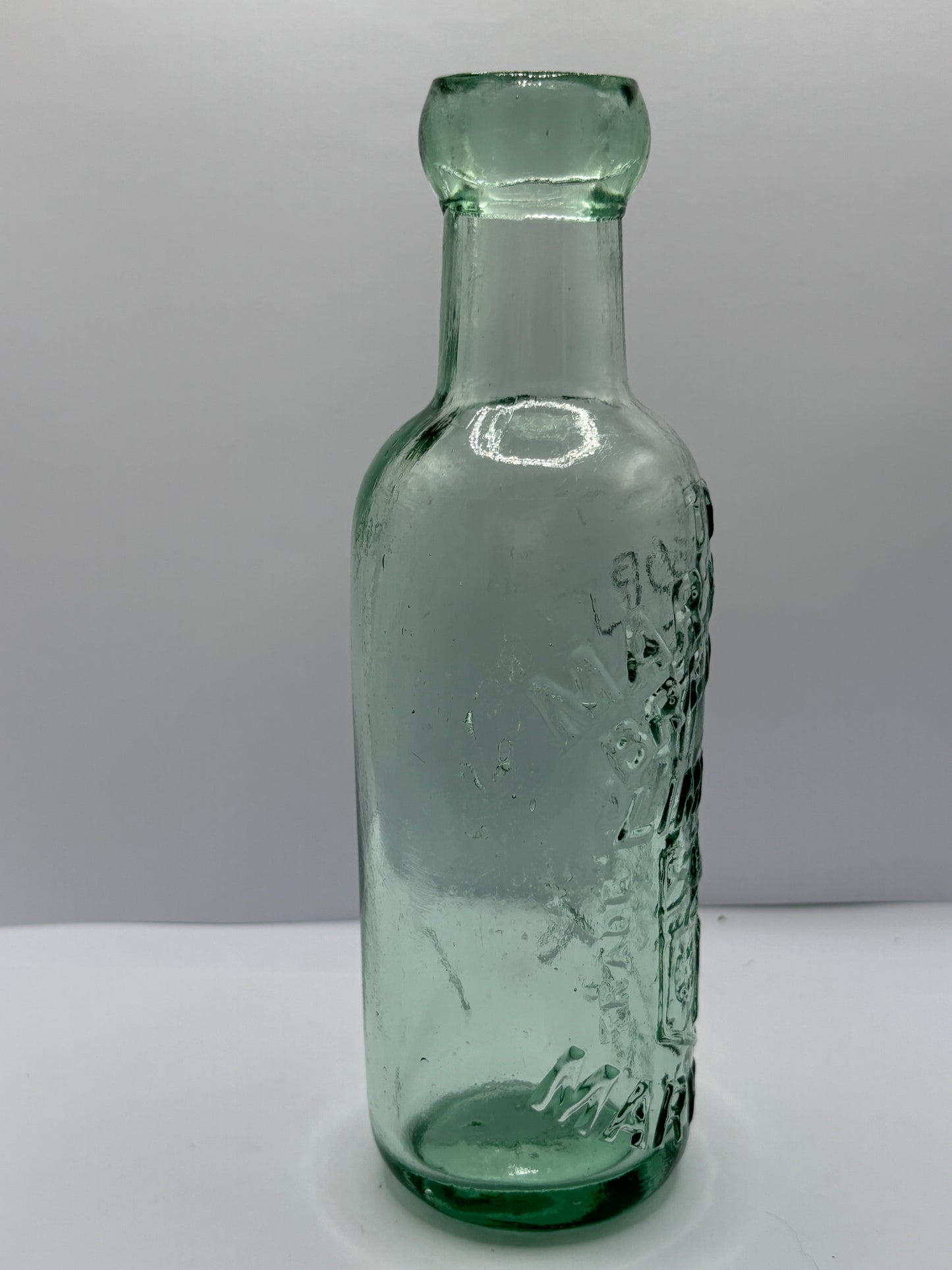 The Maryport brewery, aqua glass mineral water bottle