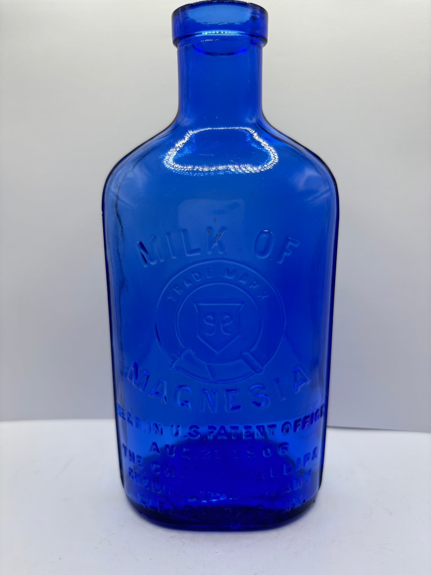 Old blue milk of magnesia bottle