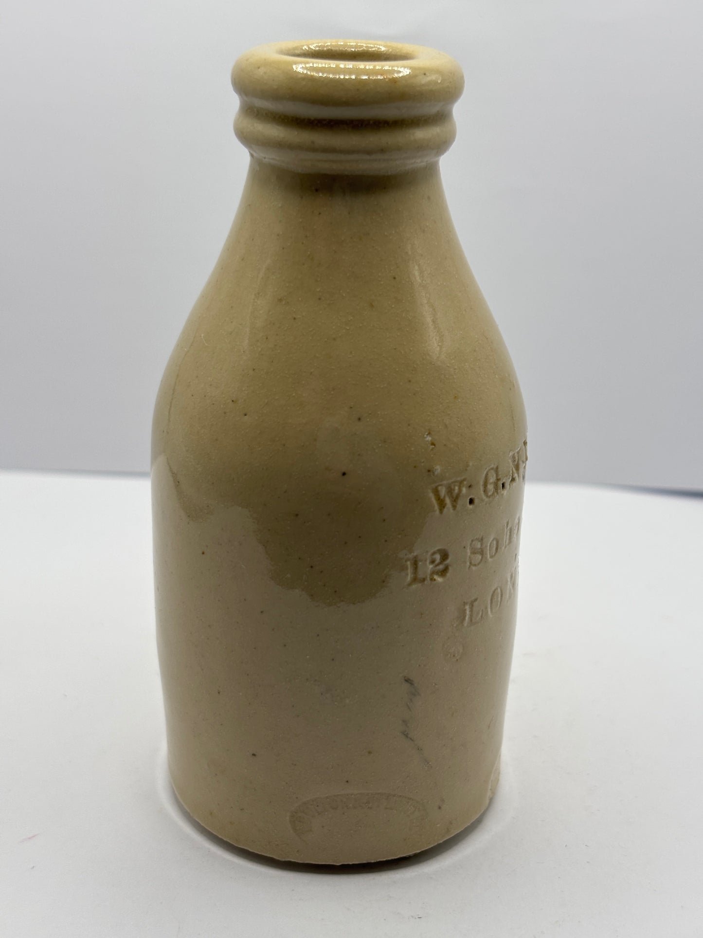 Old stoneware bottle, Nixey London