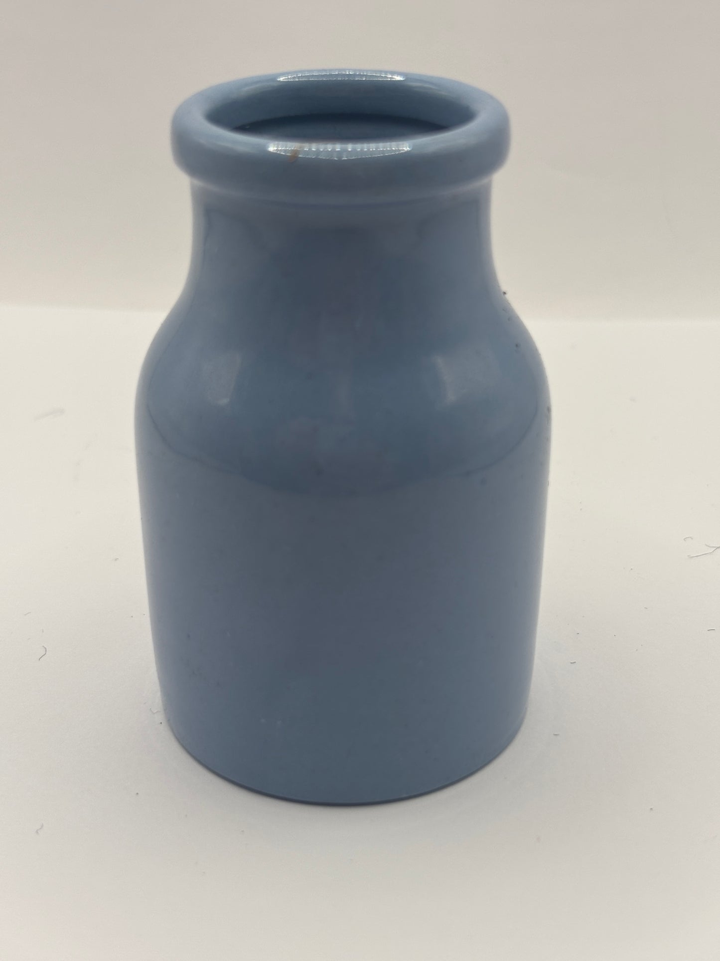 Old small blue stoneware jar