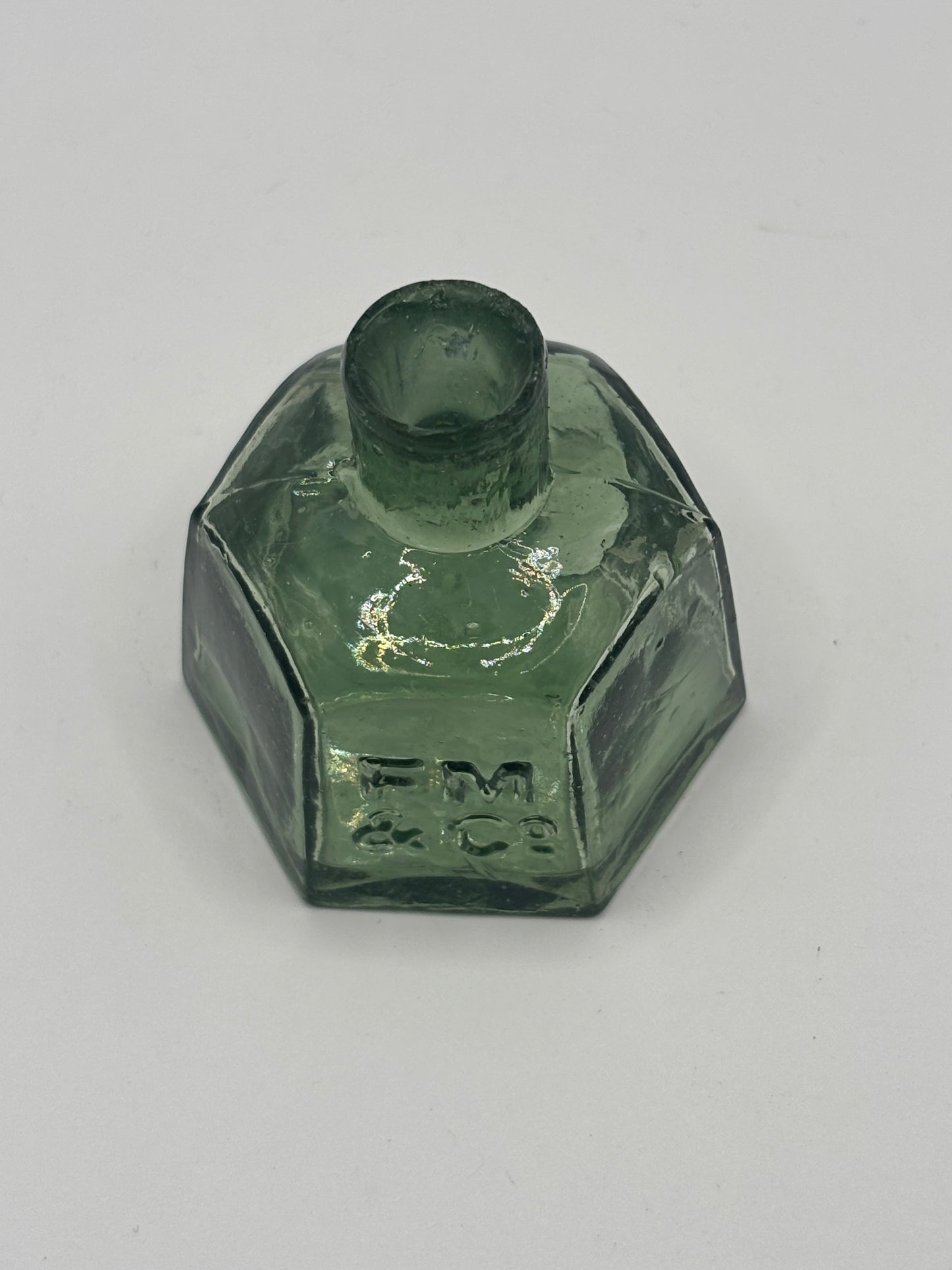 Old green glass advertising inkwell, penny ink, FM & Co
