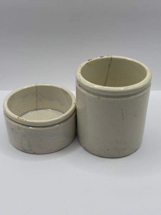 2 old stoneware pots. Hairline