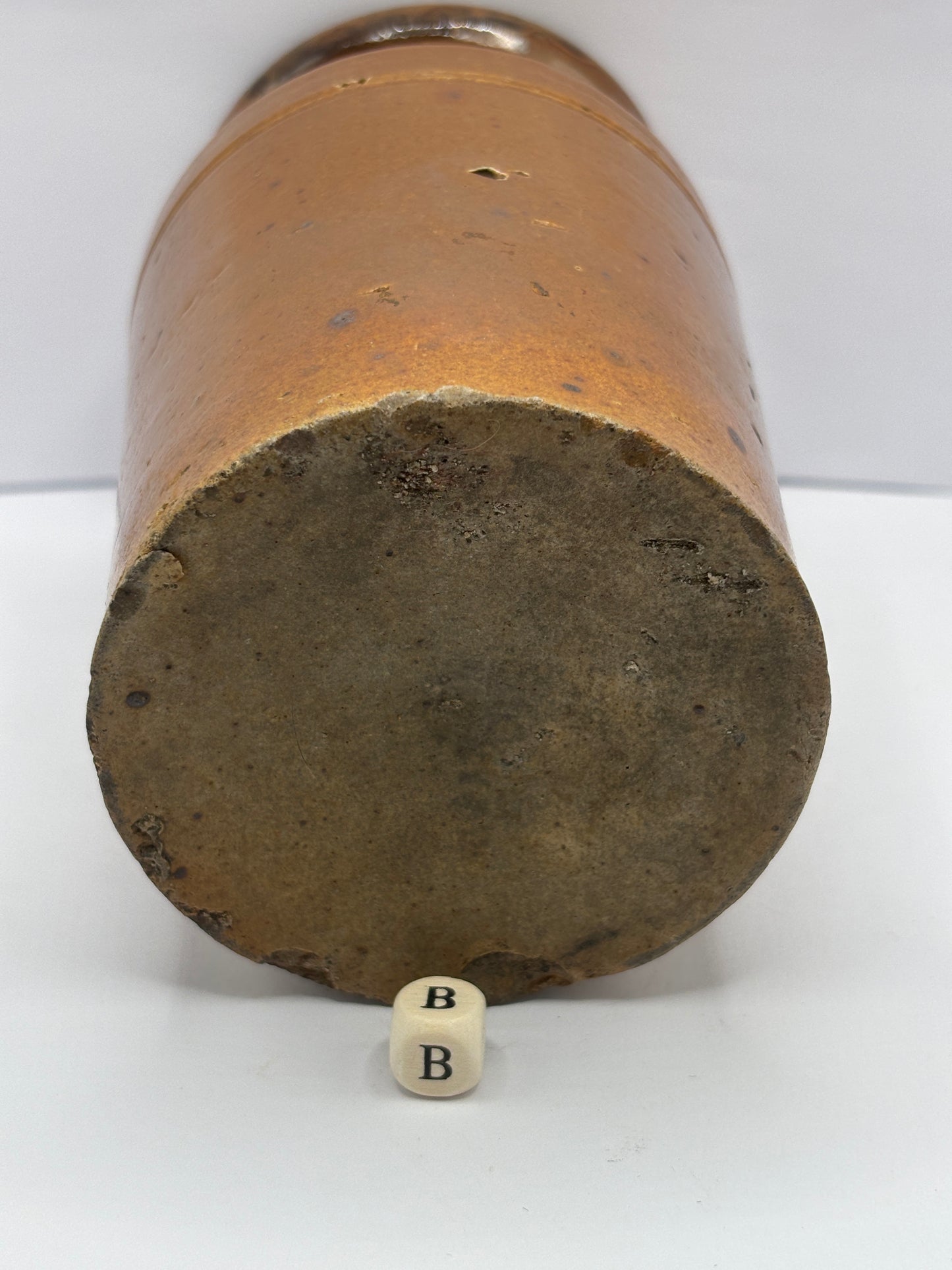 Old brown stoneware jar (B)