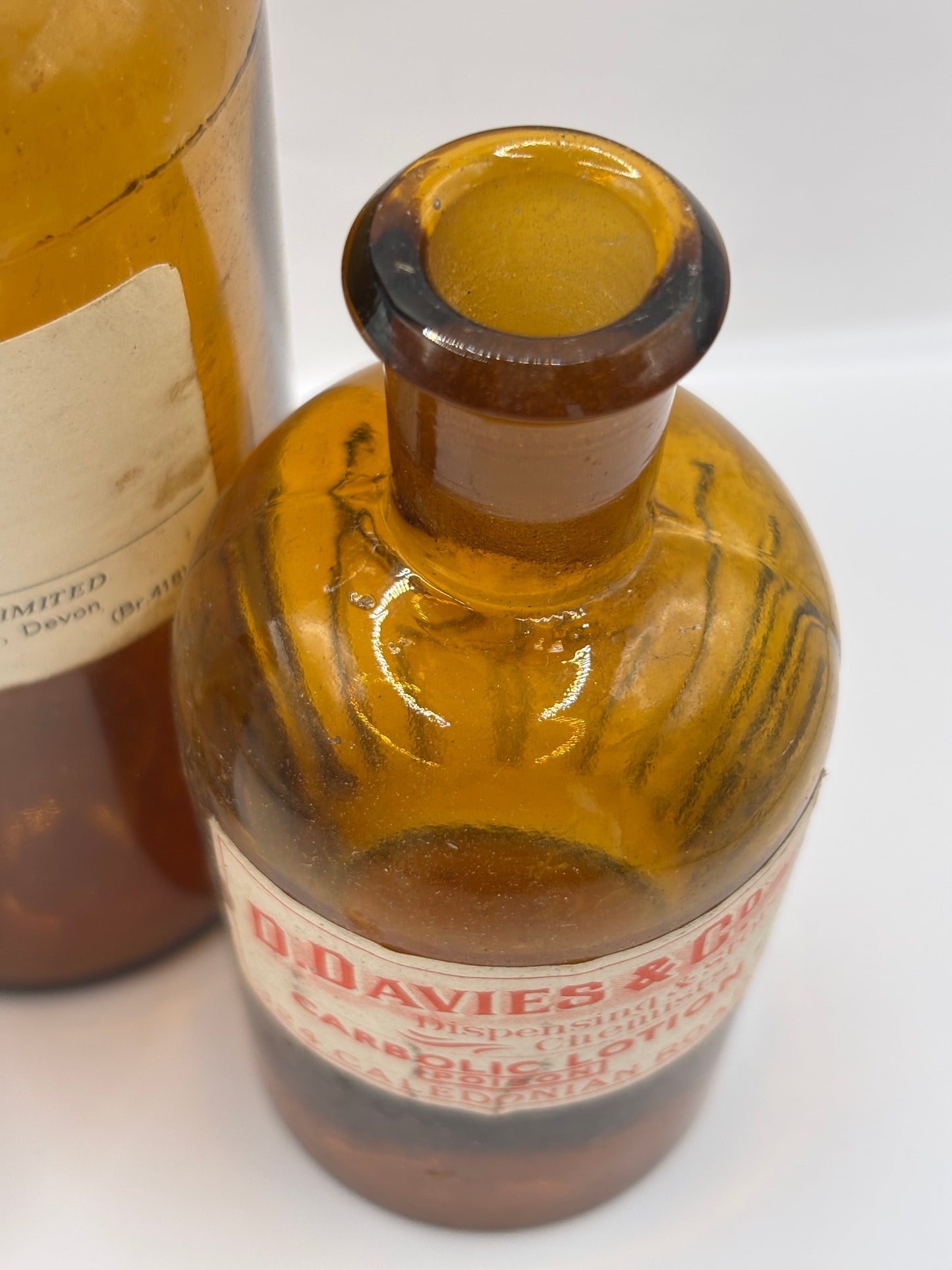 3 old chemist bottles with added labels (B)