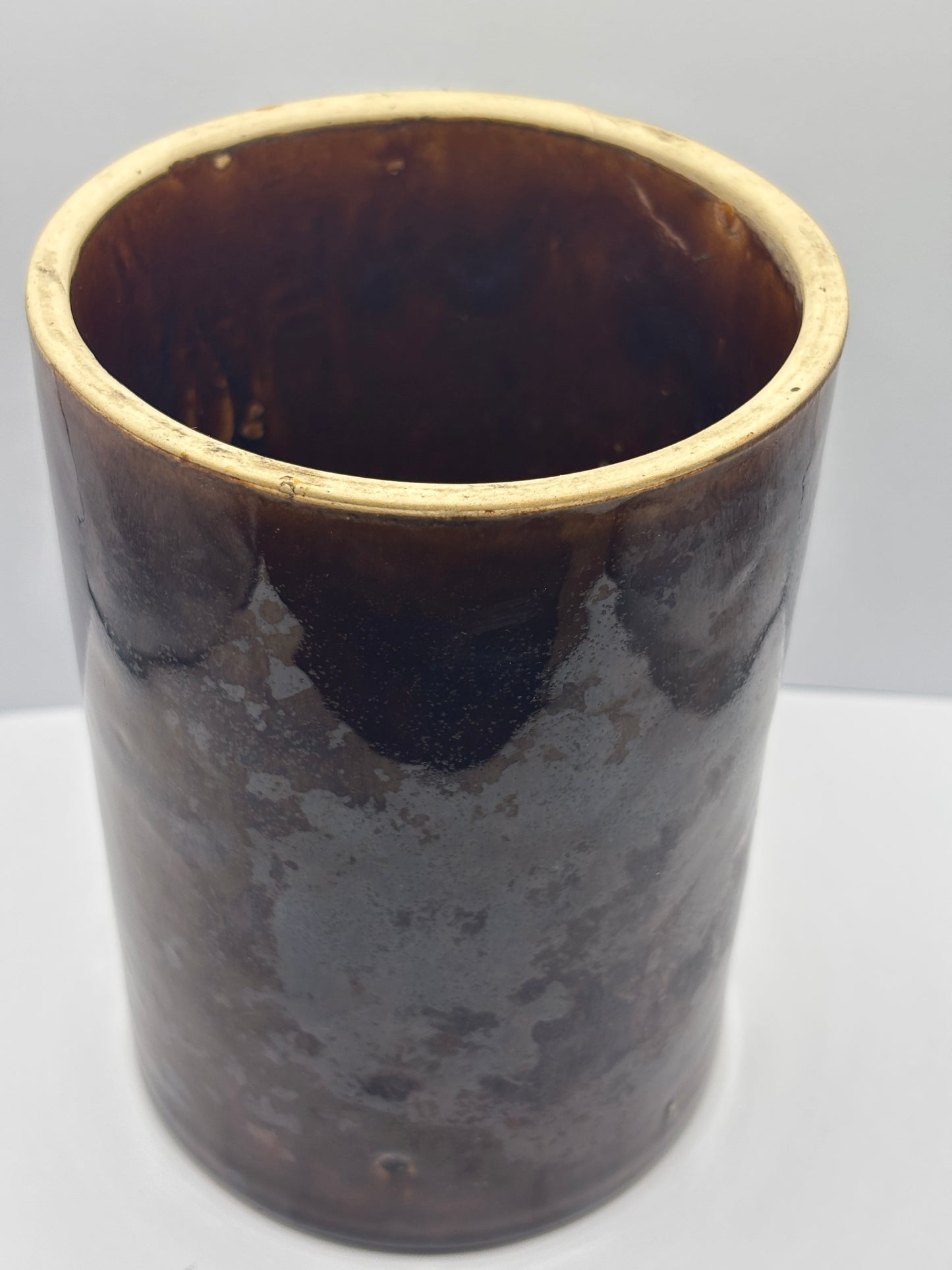 Old brown stoneware pot