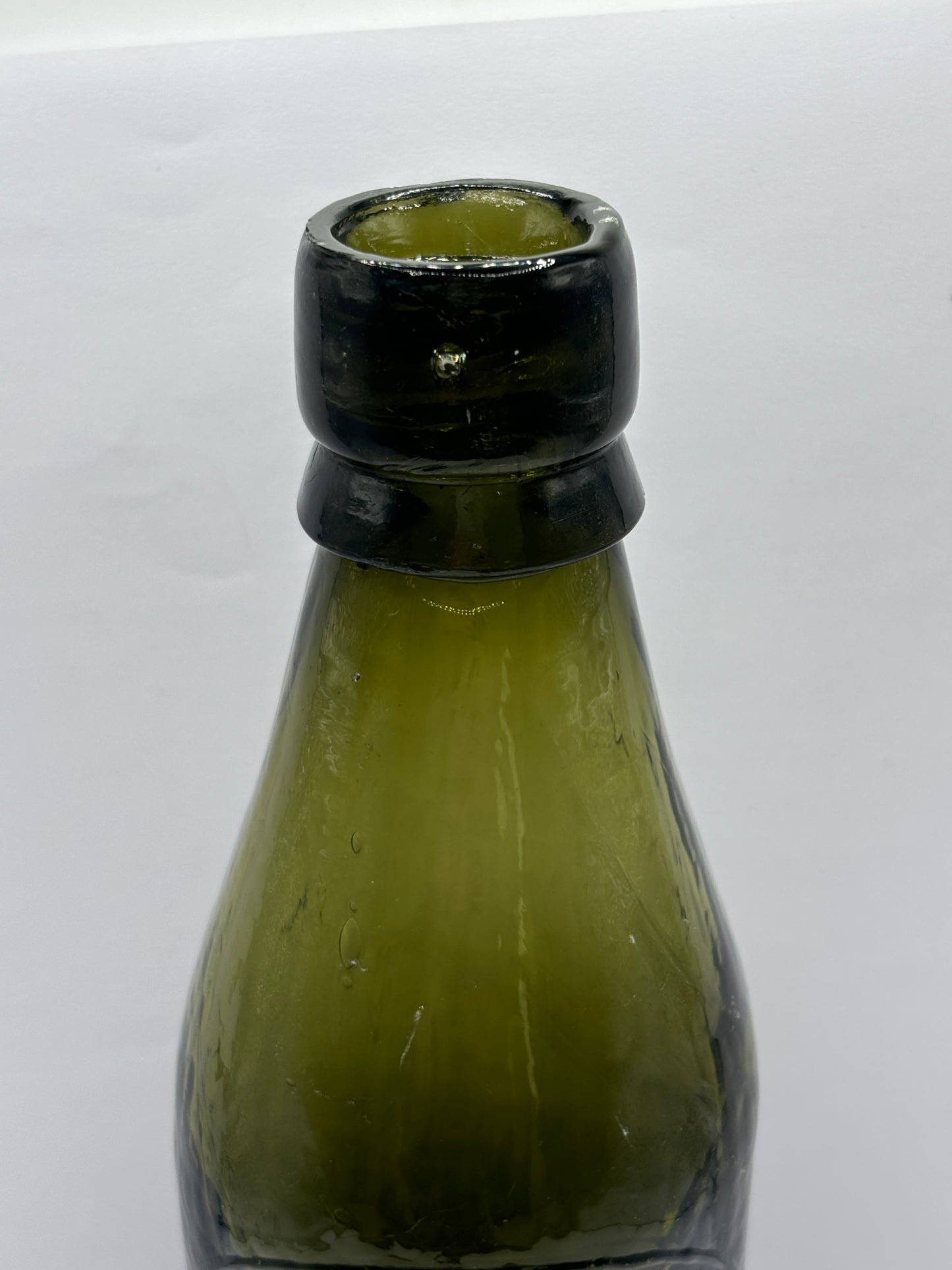 Old green glass North Sheilds beer bottle