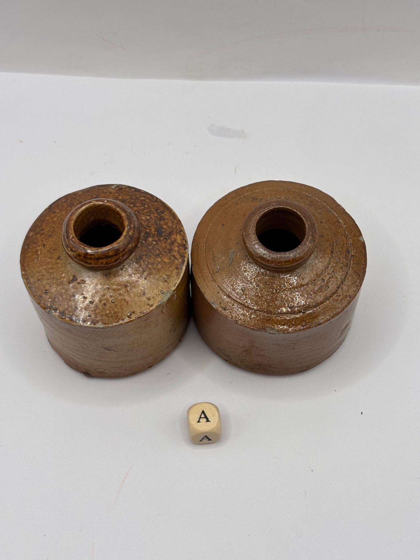 2 brown stoneware inkwells, ink bottles (a) pork pie inks