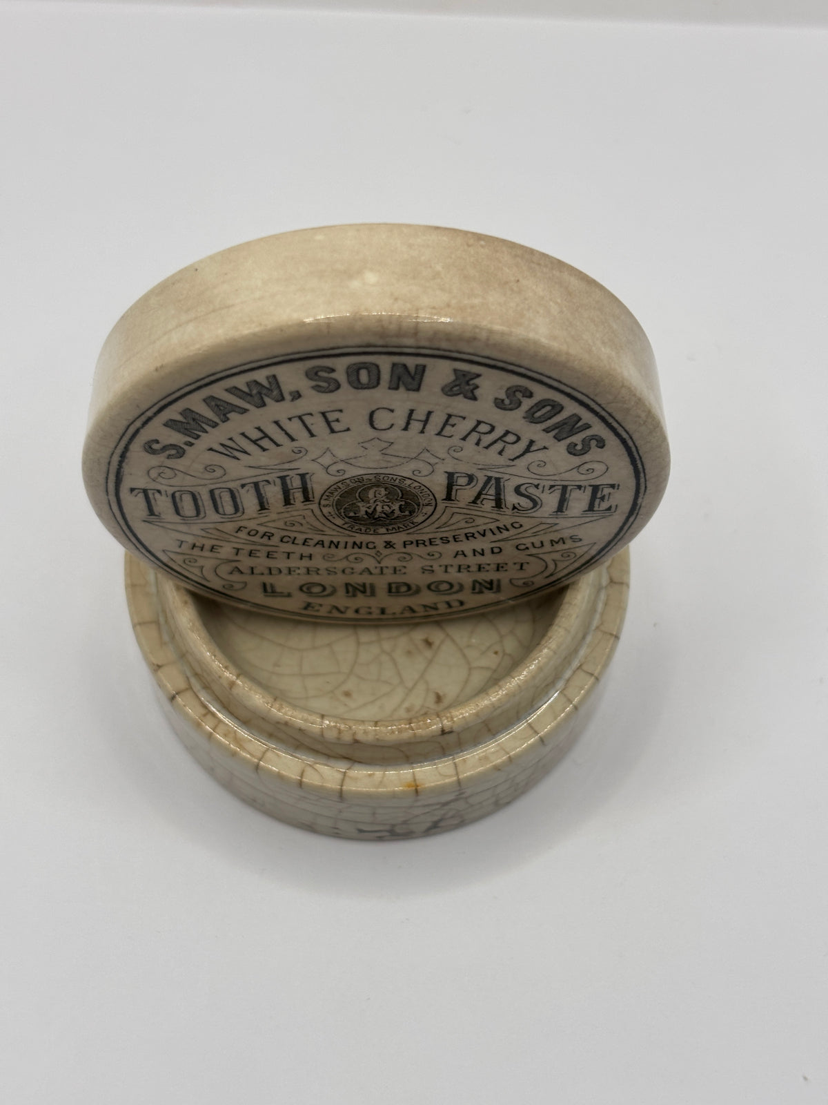 Old advertising lid and base. White cherry tooth paste 🍒