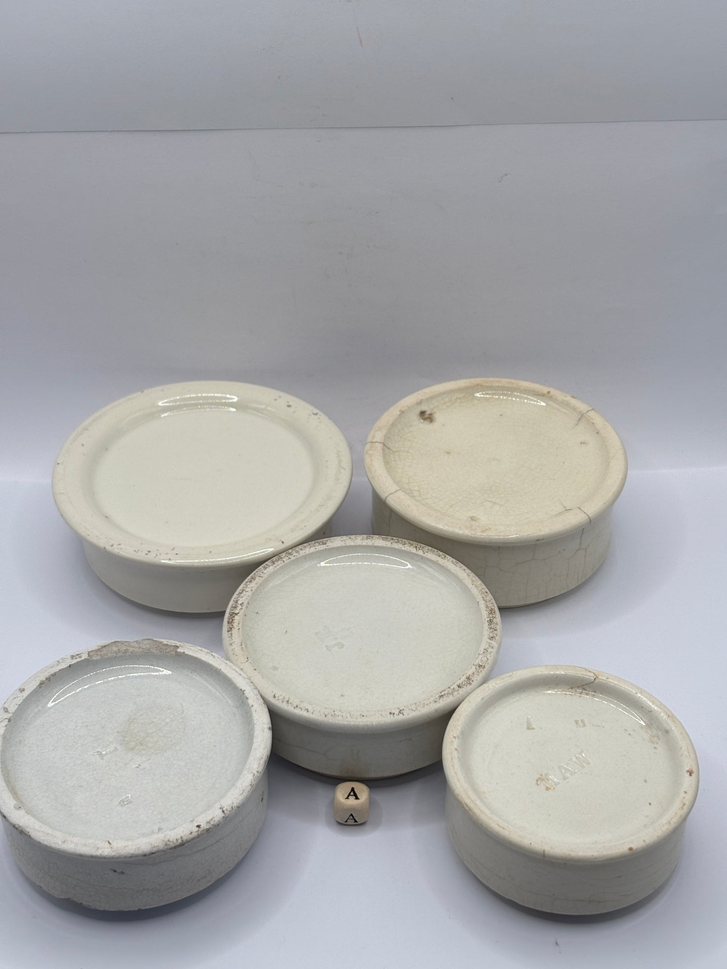 5 old stoneware bases, stackers (a) damages