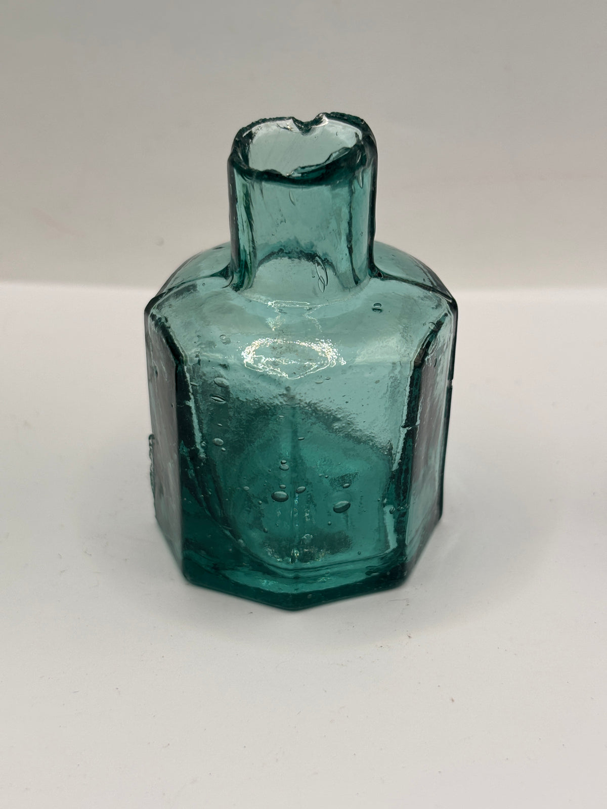 Old dark aqua glass inkwell, ink bottle, penny ink