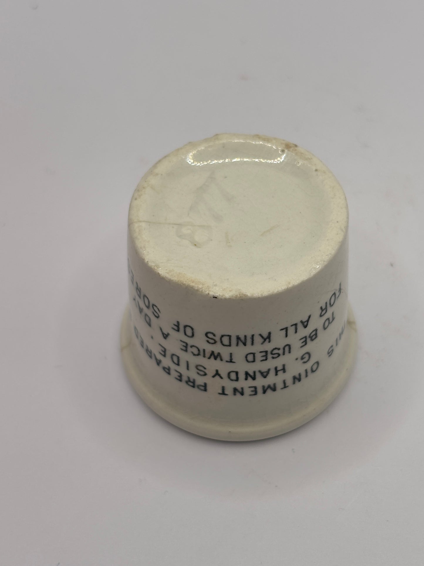 Old early advertising ointment pot, Handyside ointment