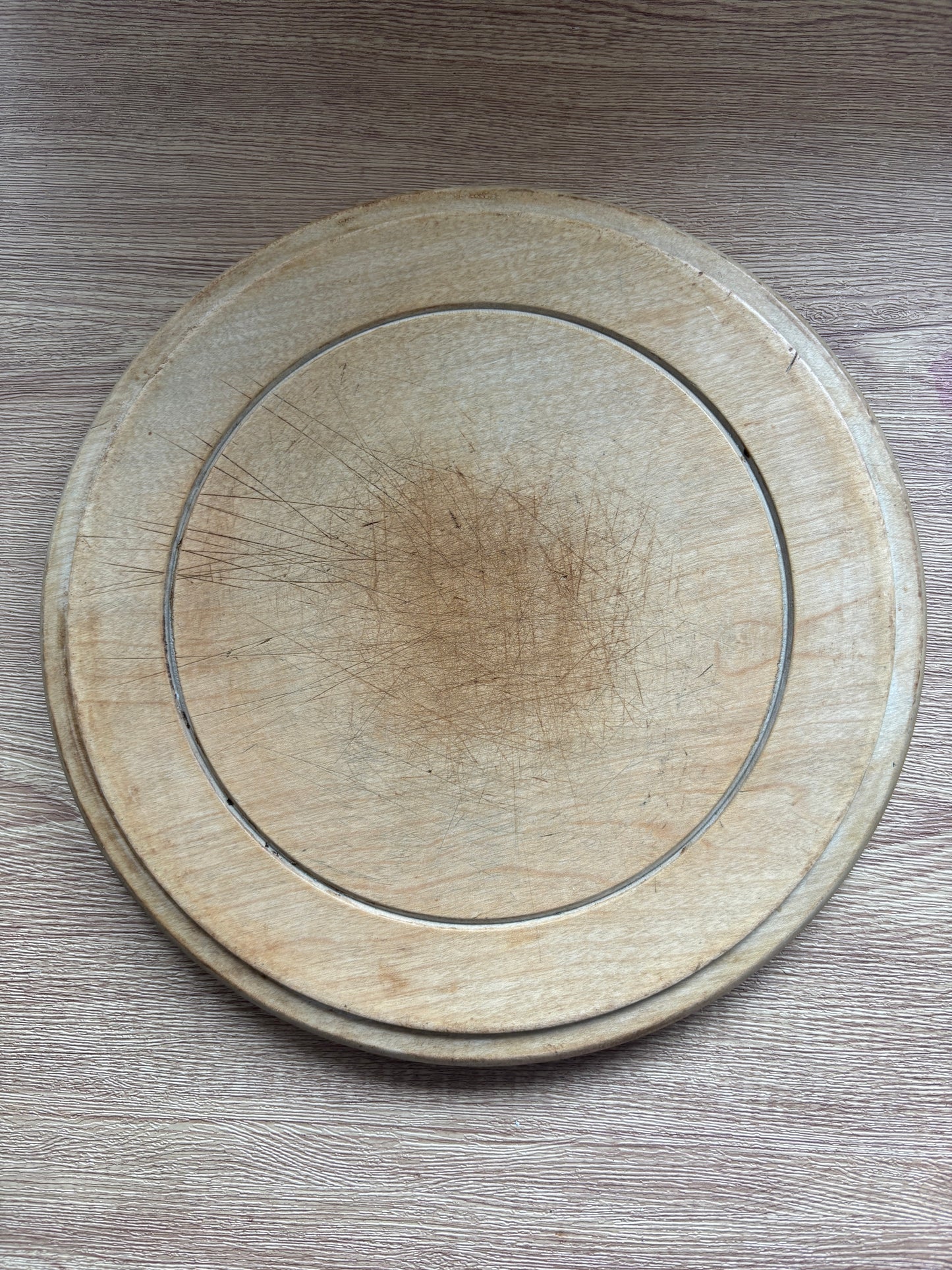 Old wooden carved bread board