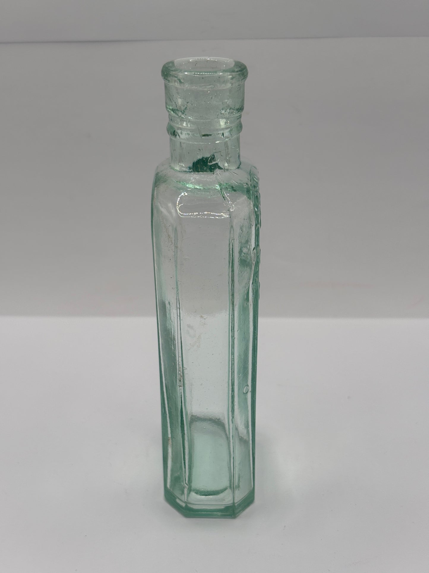 Old glass advertising chemist bottle, Days oil of the night
