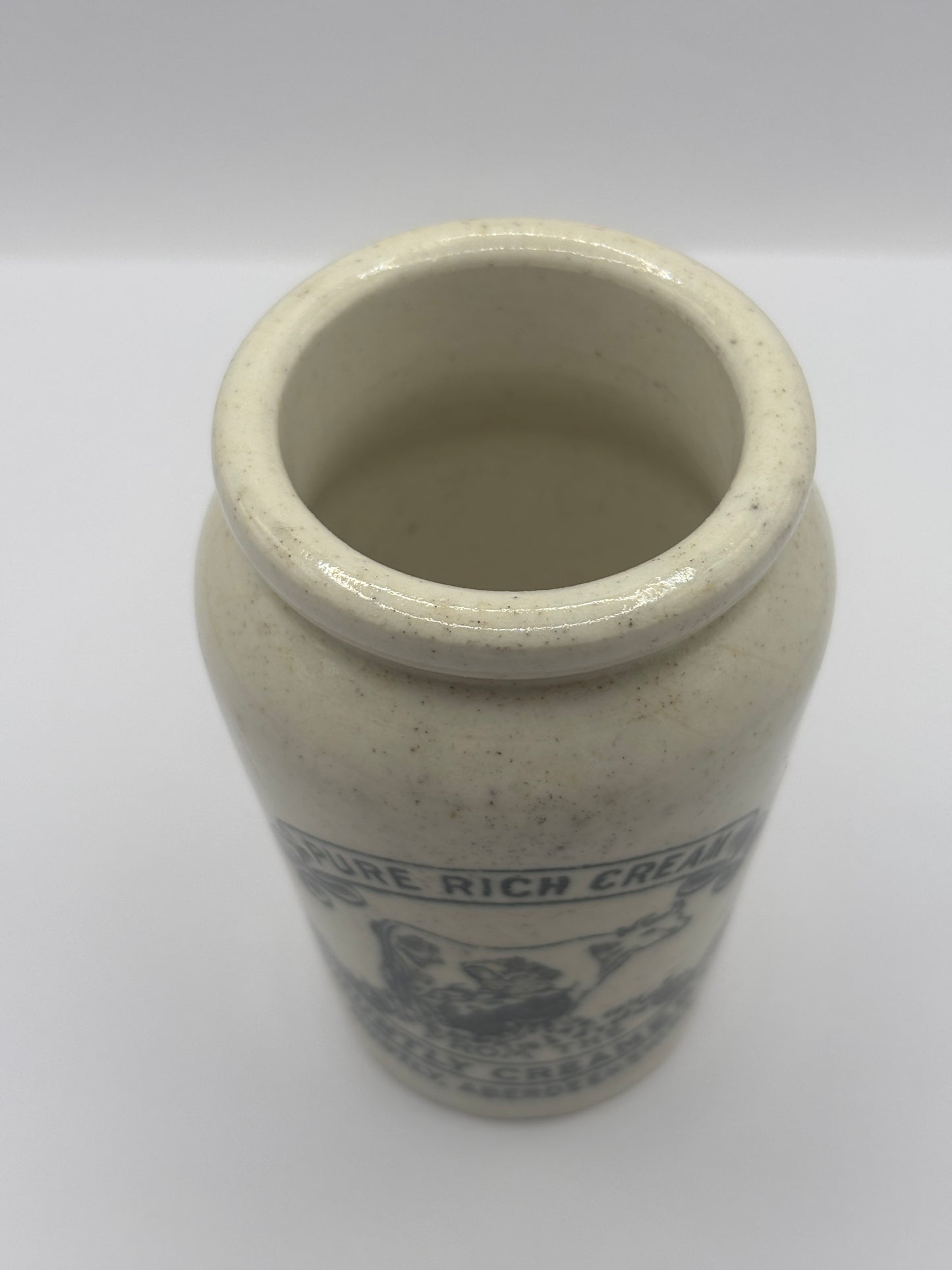 Old advertising cream pot, Huntly creamery. Milk maid. Pure rich cream