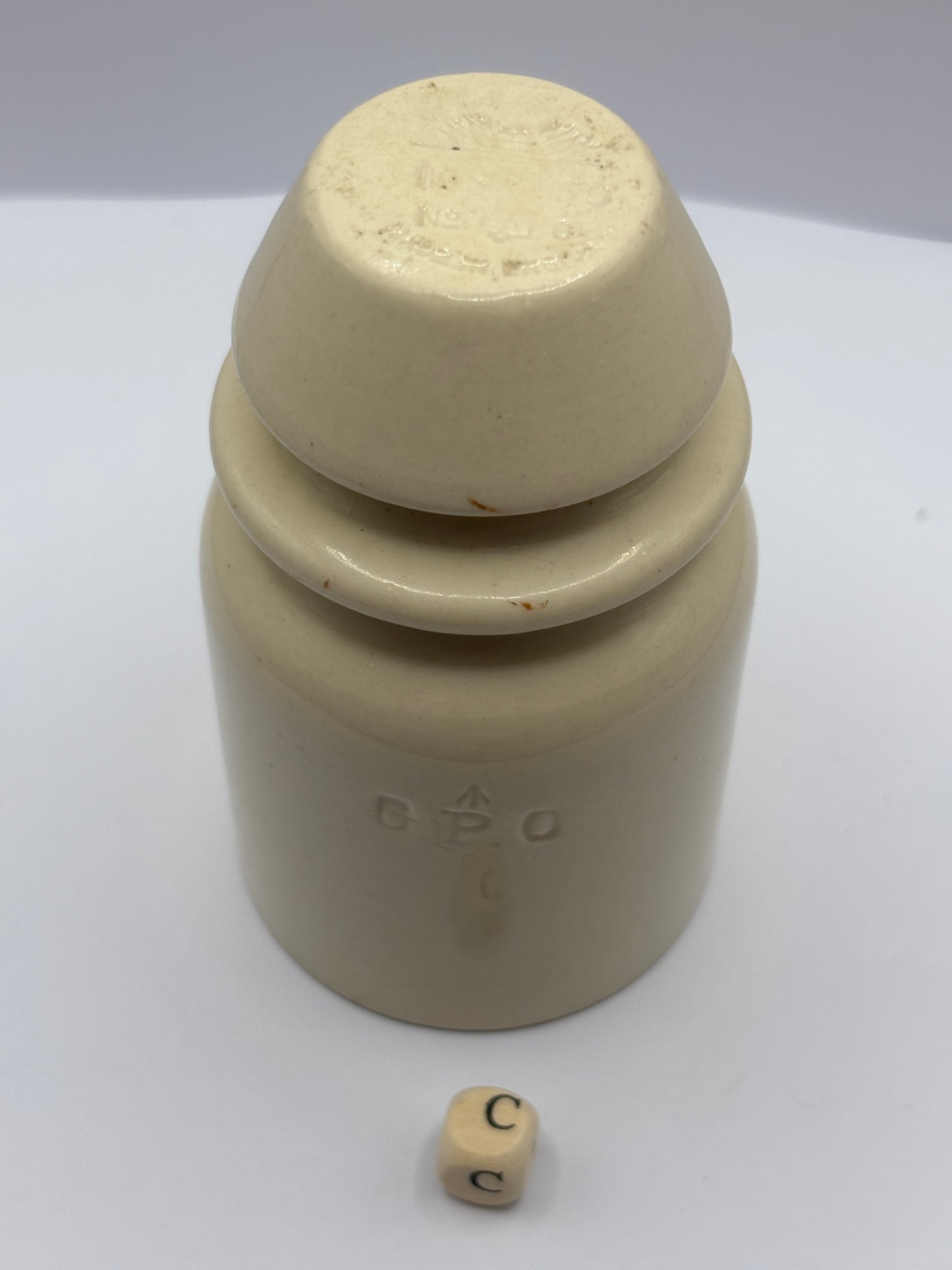 Old stoneware telegraph pole insulator (c)