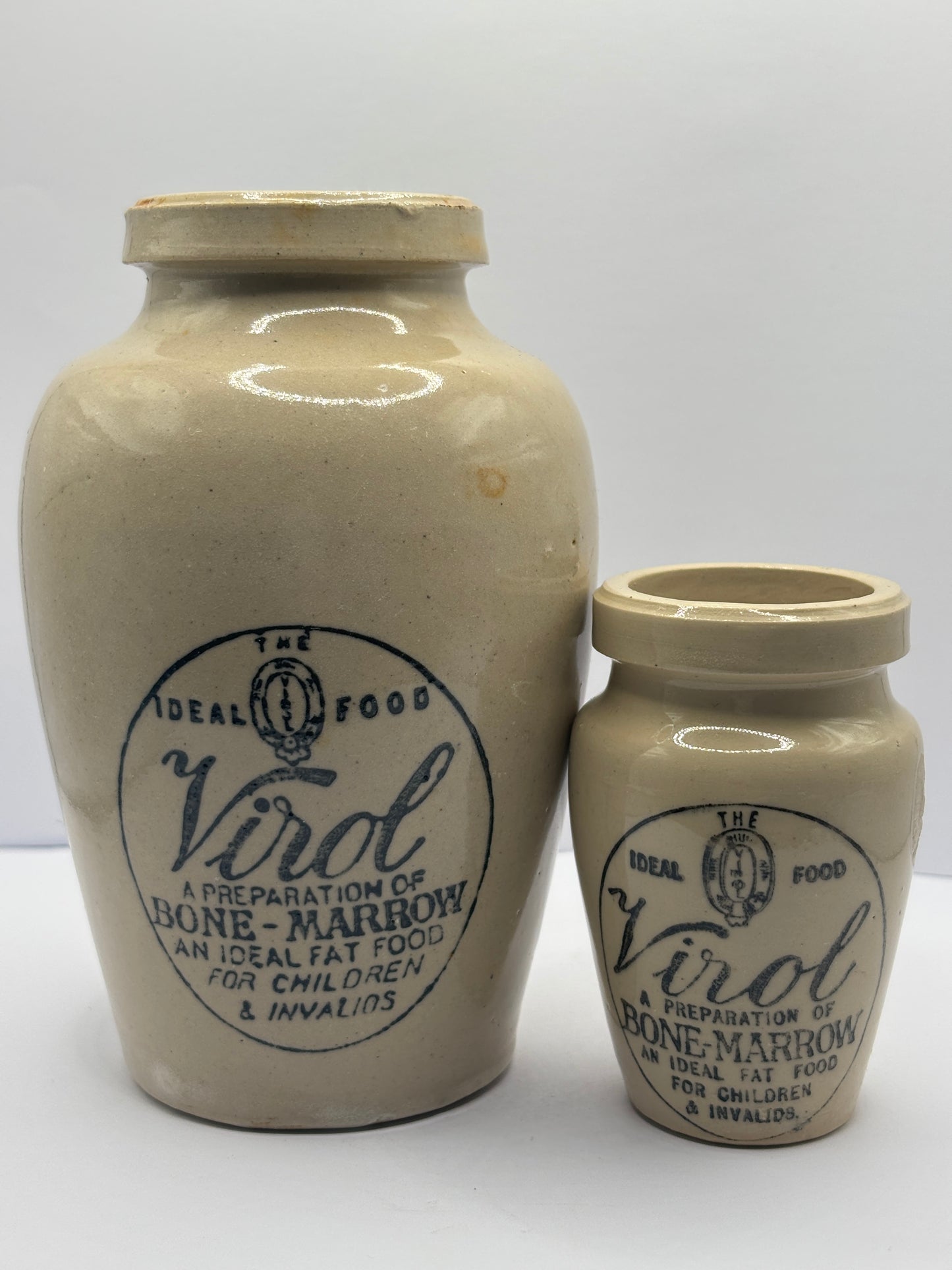 2 Old stoneware advertising Virol jars