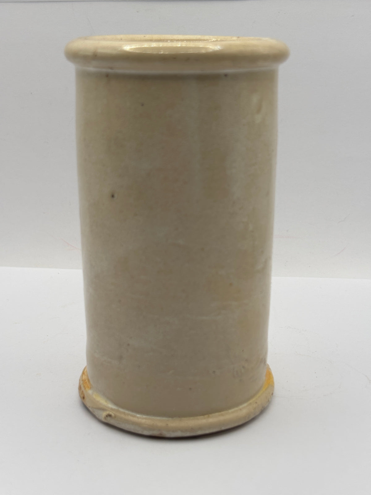 Old tall stained stoneware cream pot
