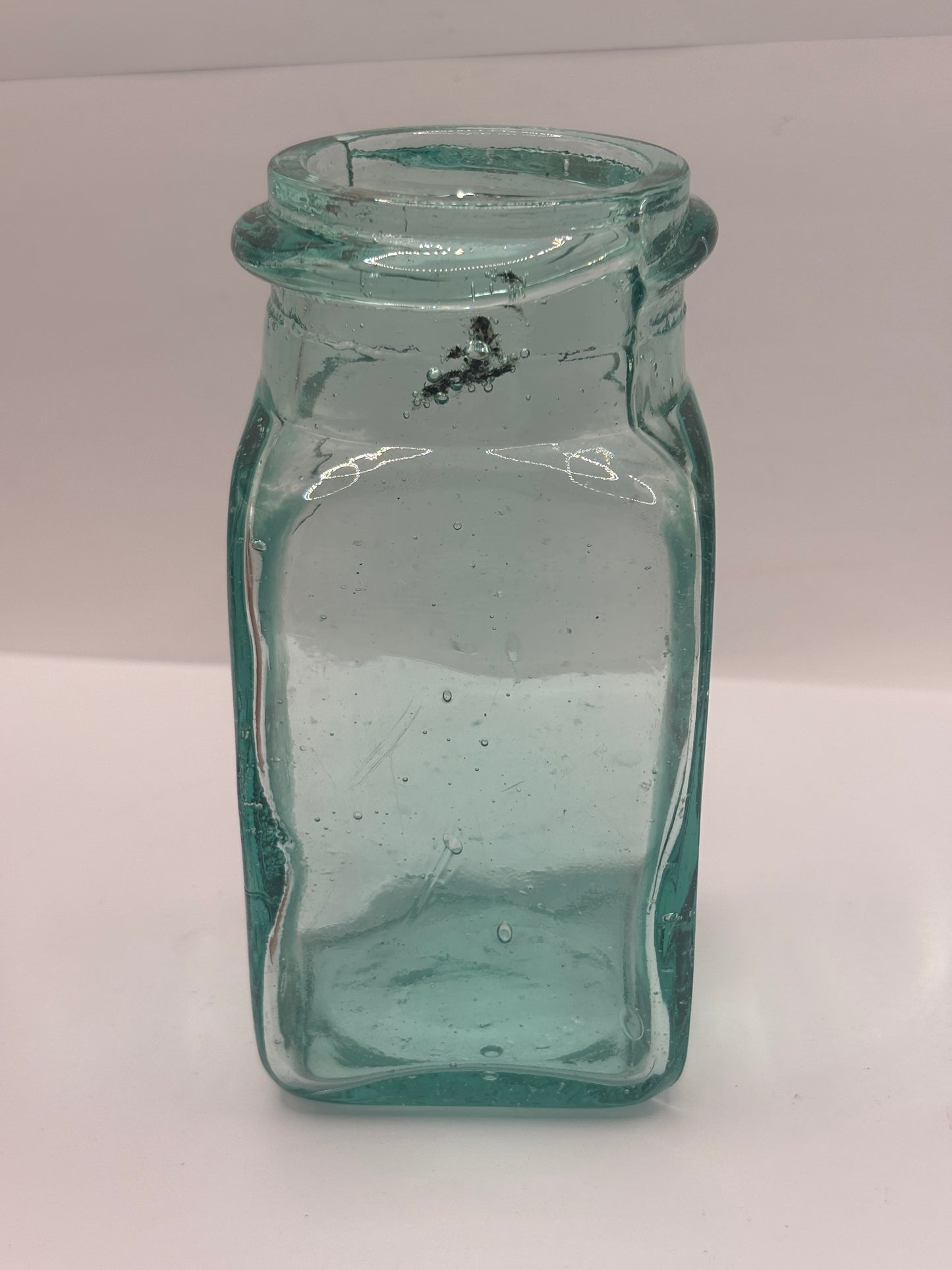 Old aqua glass pickle jar