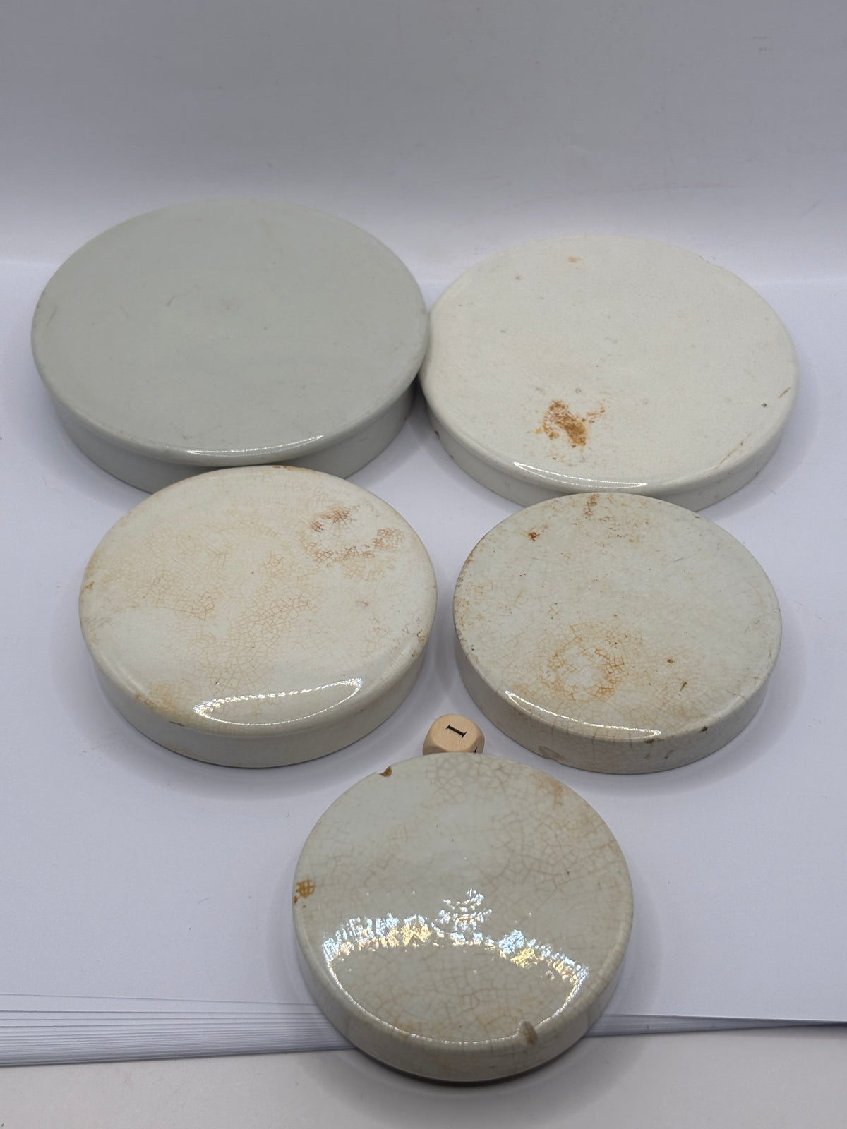 5 old stoneware lids, stackers (i)