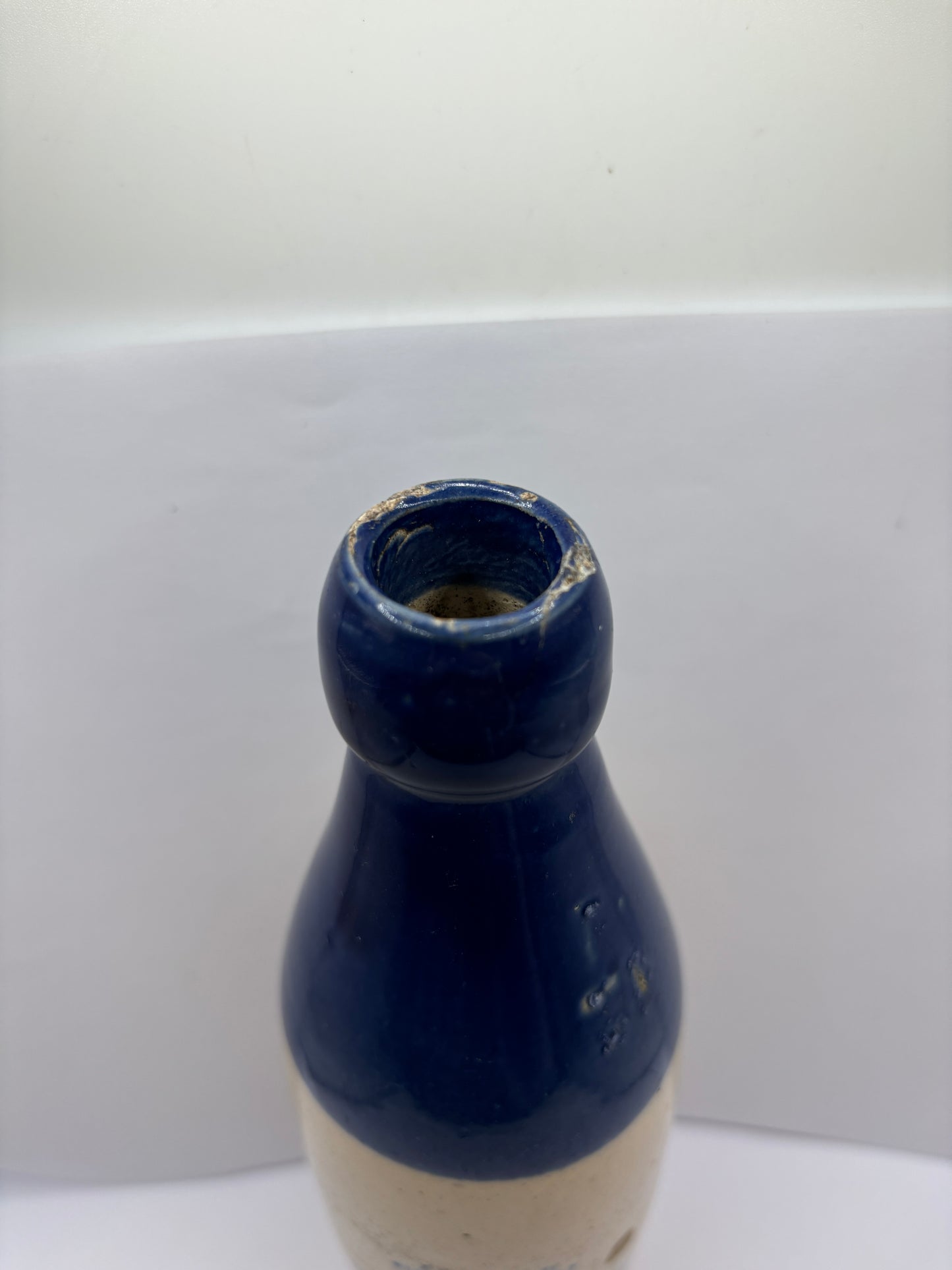 Old blue top ginger beer bottle