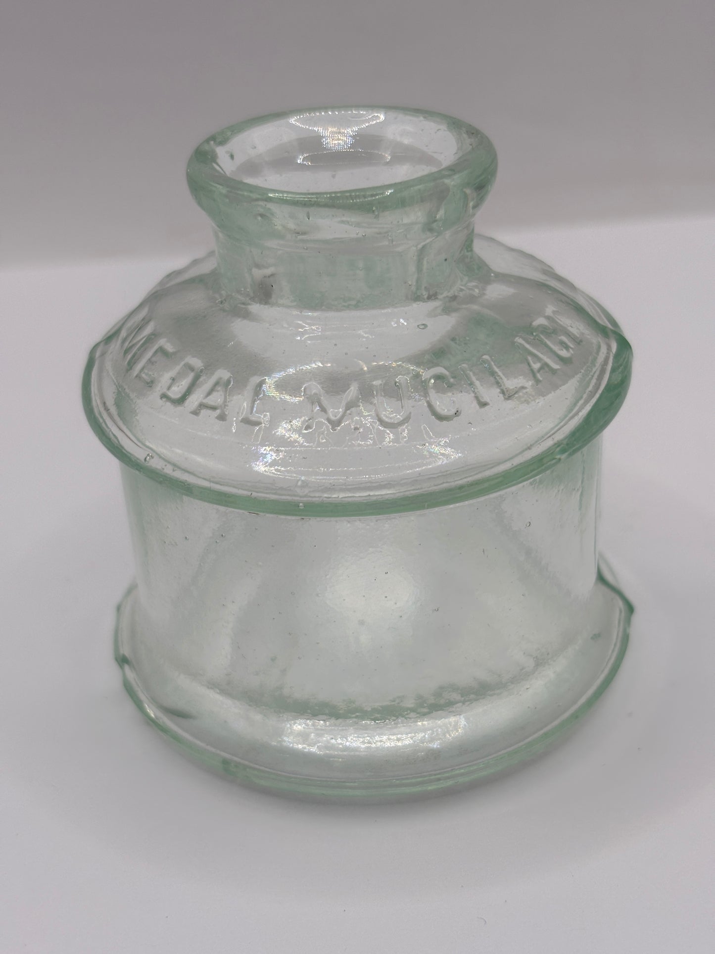 old advertising glass ink,ink bottle, mugilage le pages French?? Damaged