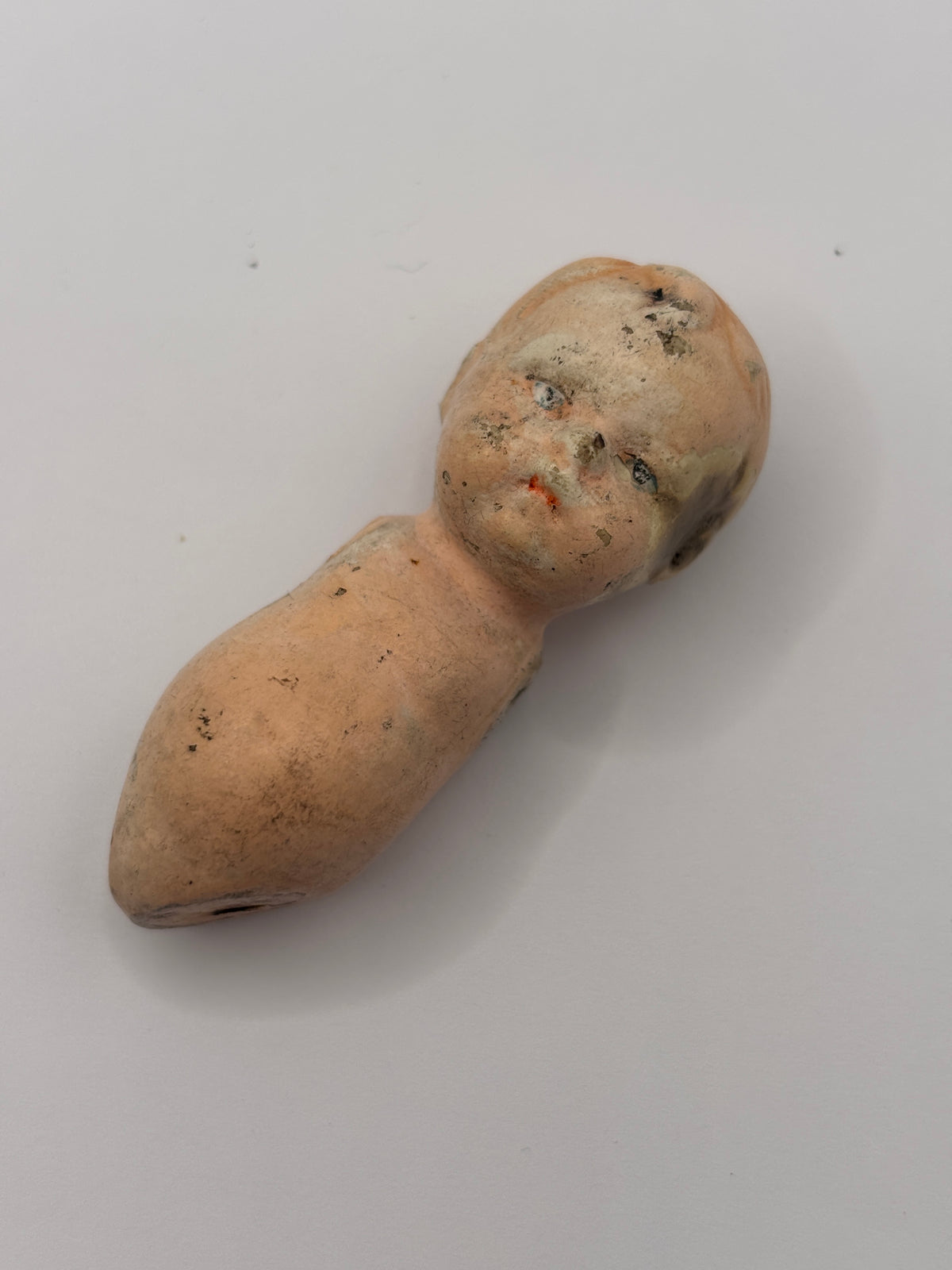 Old crusty small doll, armless & legless