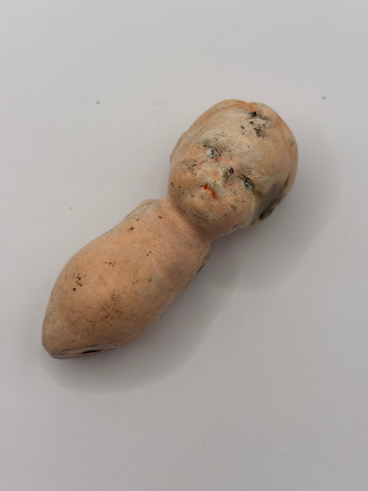 Old crusty small doll, armless & legless