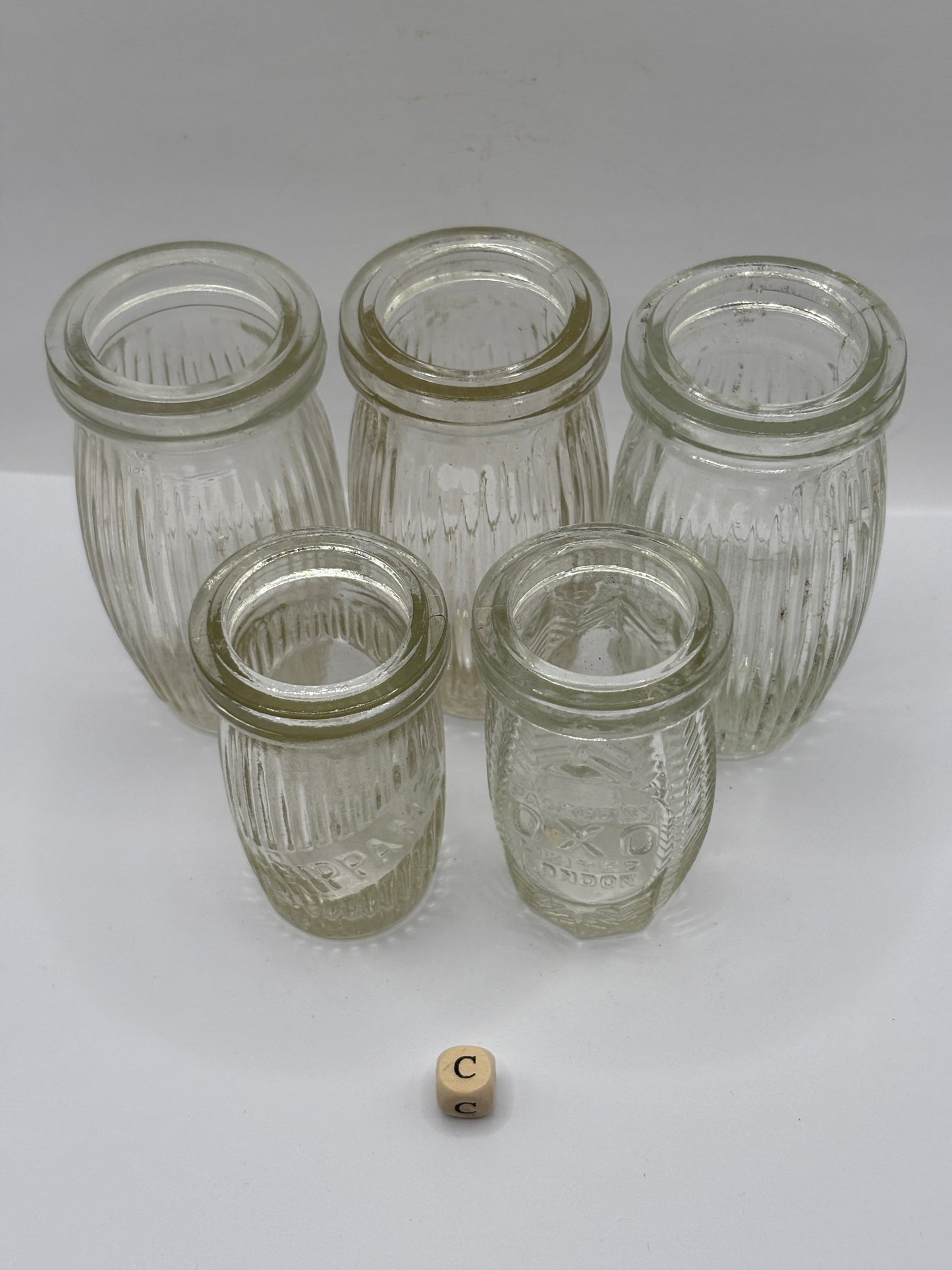 5 old clear glass meat paste jars (c)