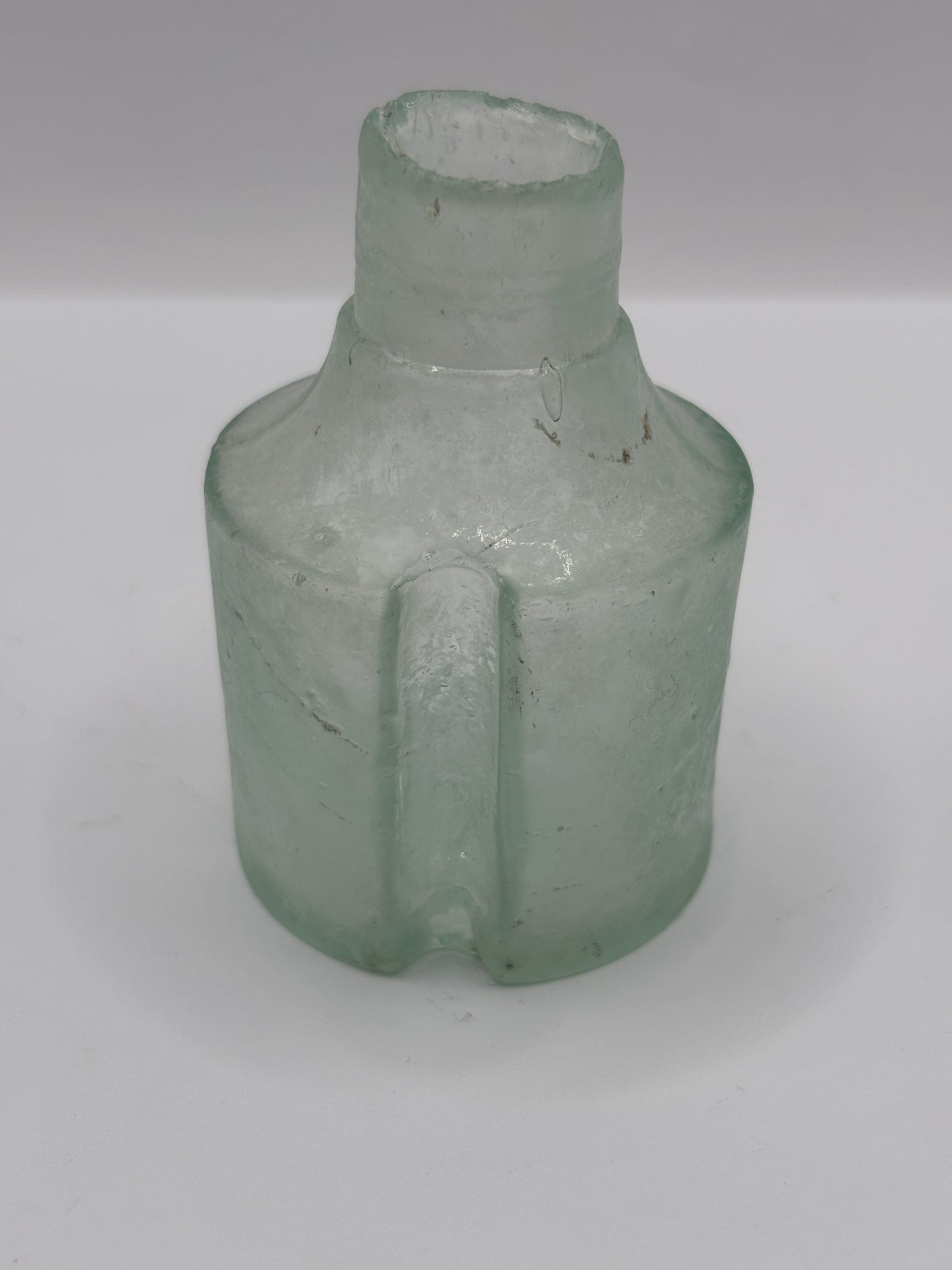 Old aqua glass inkwell, ink bottle with pen rest