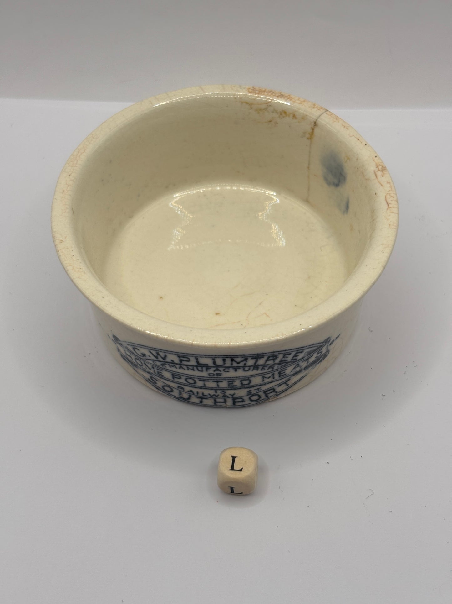 Old advertising meat paste pot, plumtrees (L) hairline