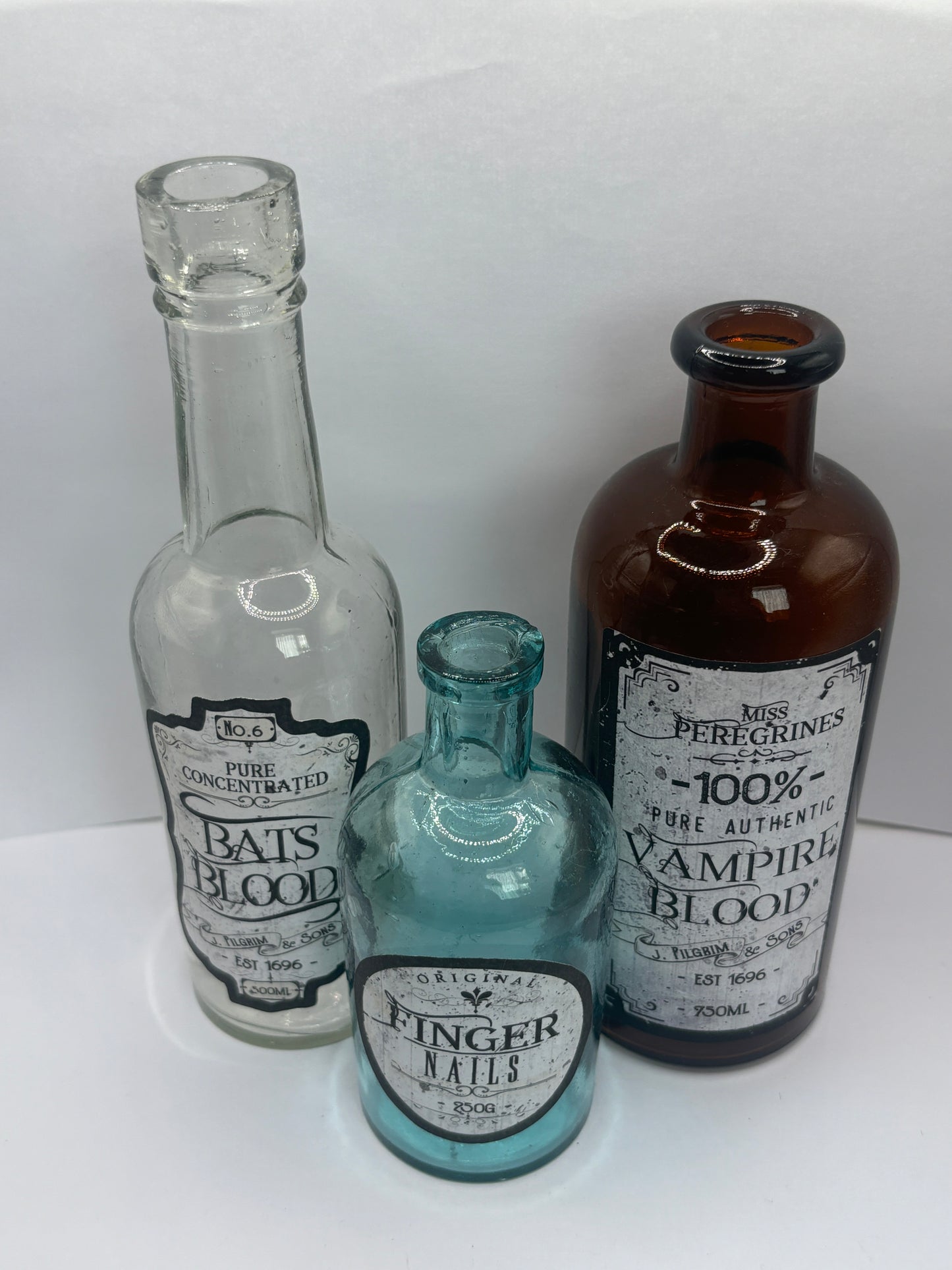 3 labelled halloween bottles