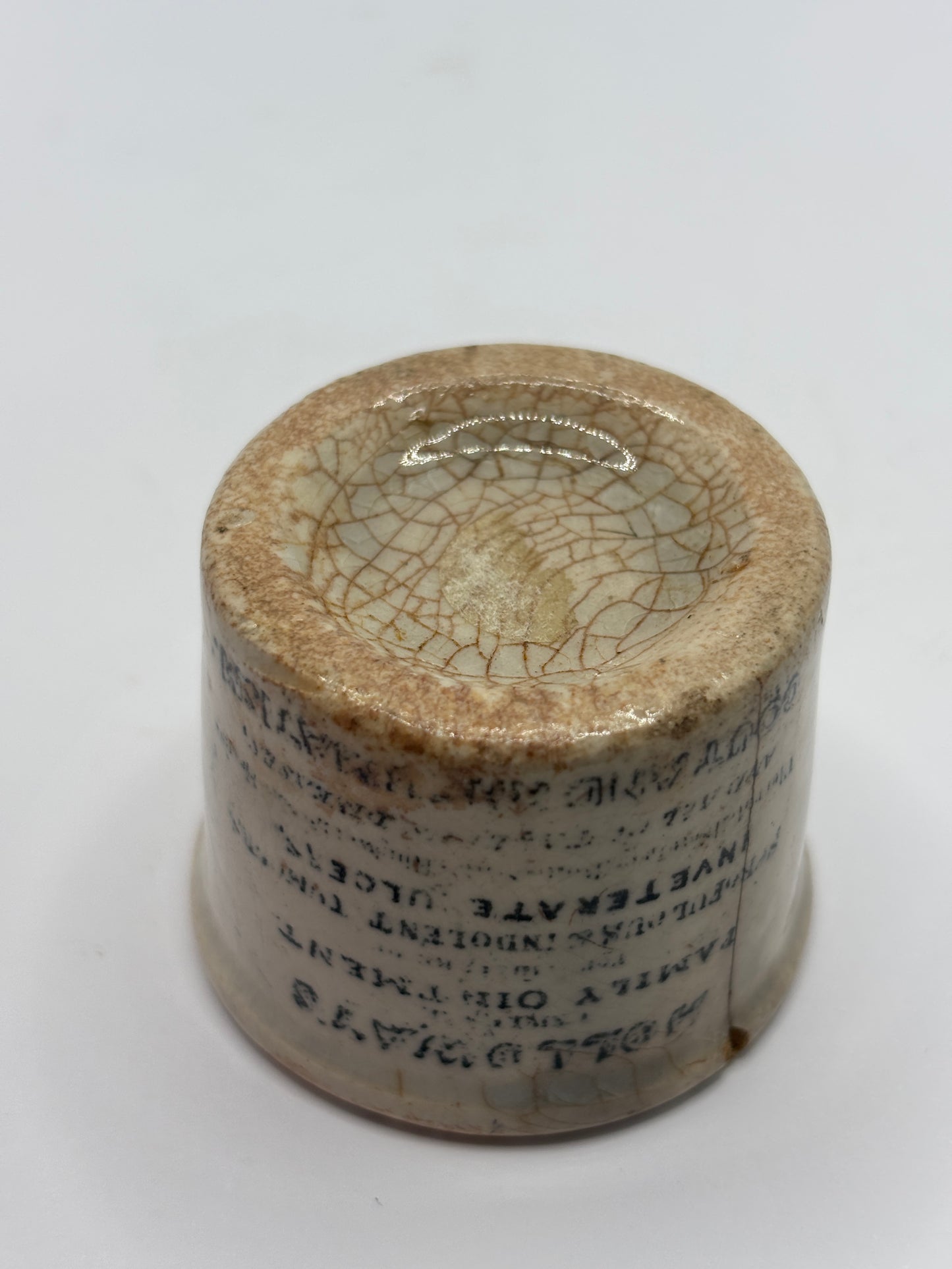 Old early Holloways advertising ointment pot
