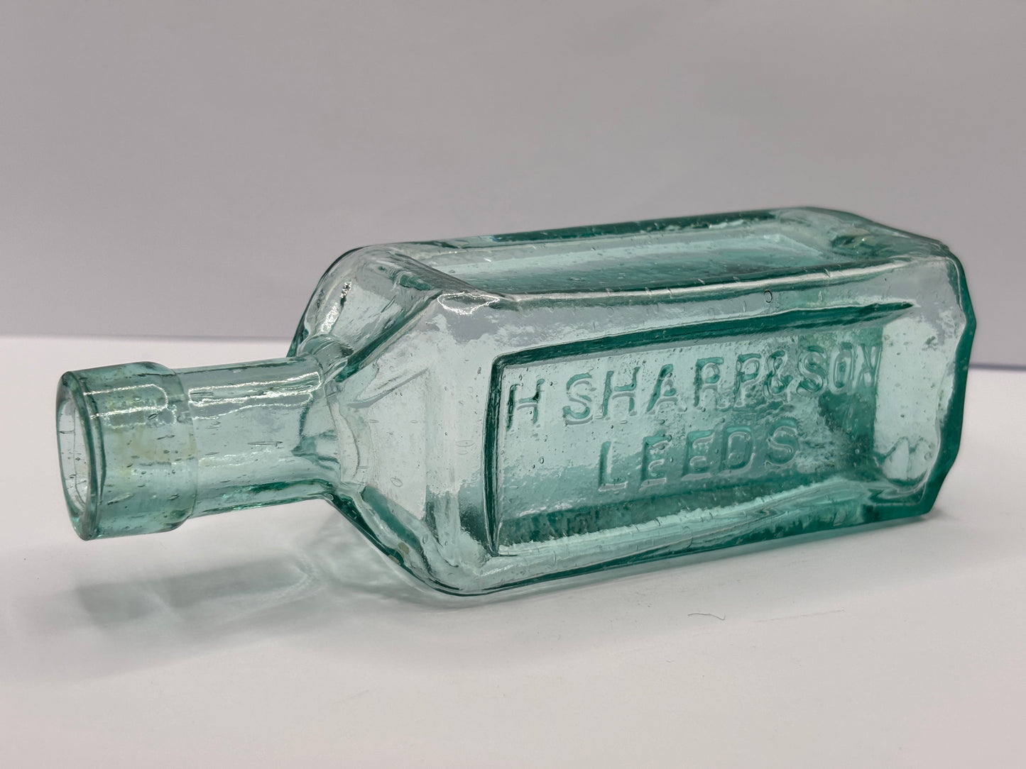 Old Leeds chemist bottle, H.Sharp & Son
