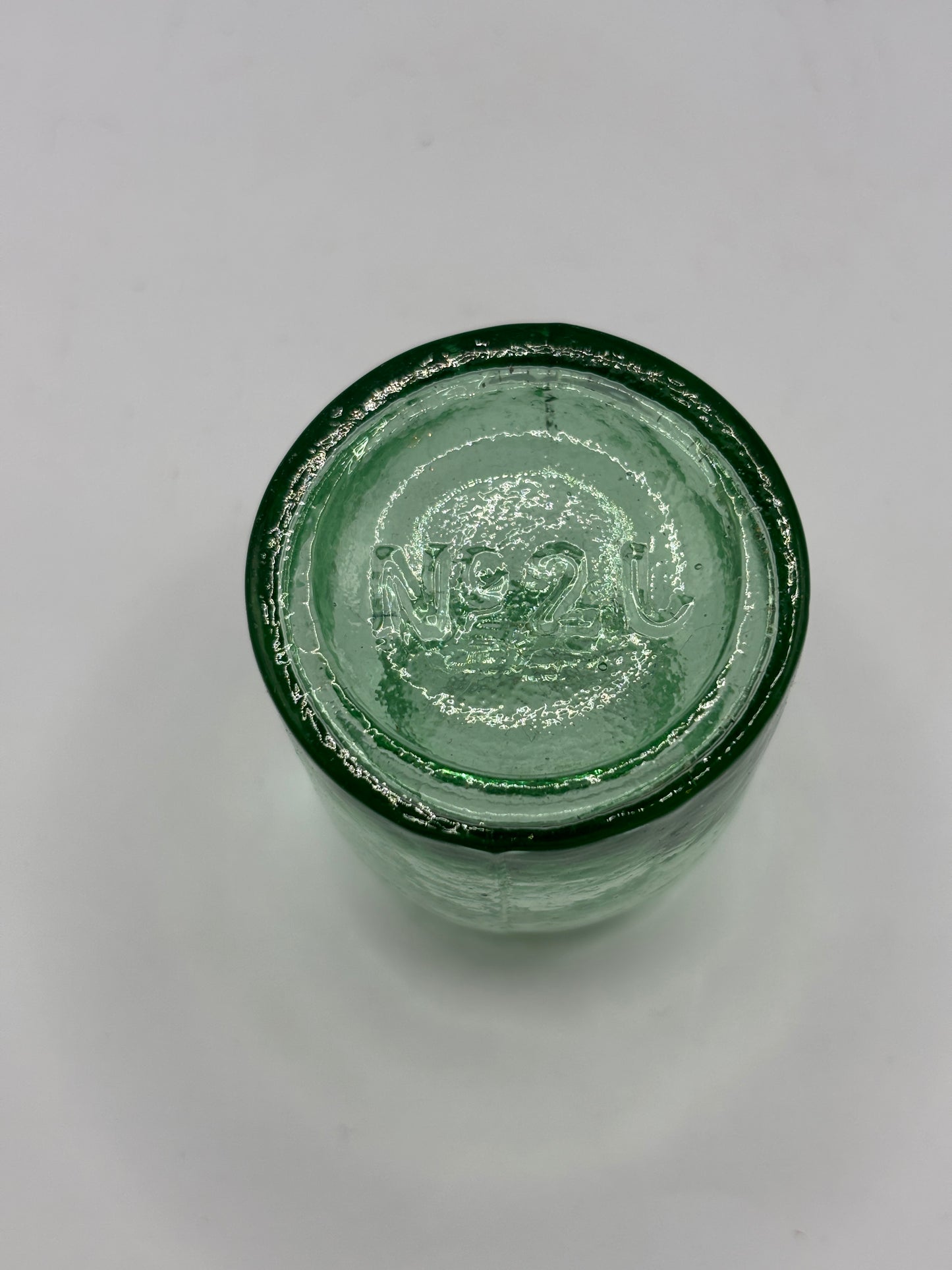Old aqua glass rat paste bottle