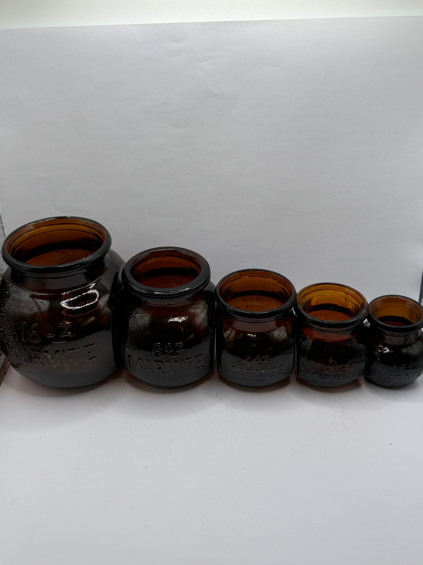 5 old amber glass marmite jars (B)