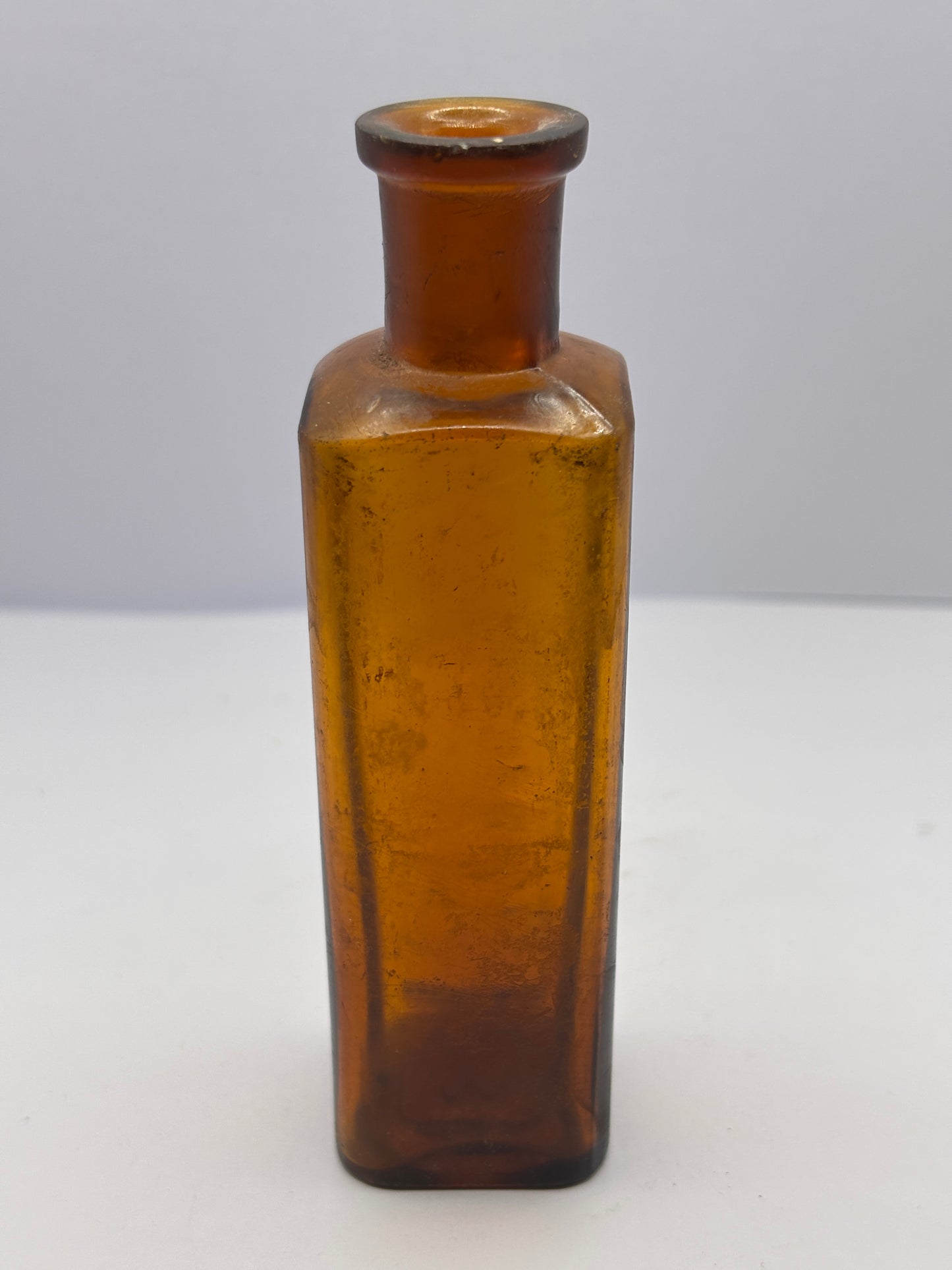 Old amber glass Boots cash chemists bottle