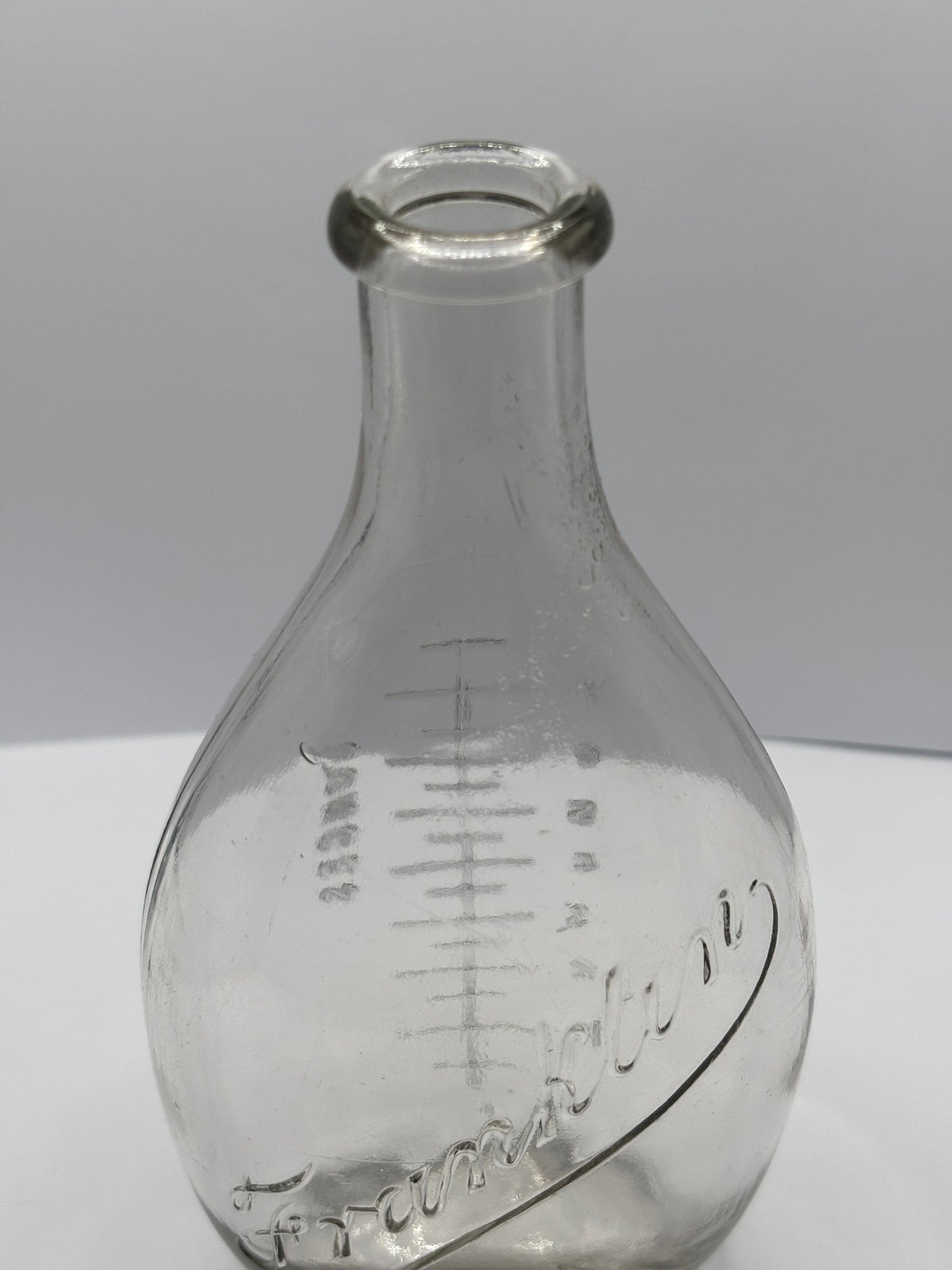 Old clear glass baby feeder. Franklin